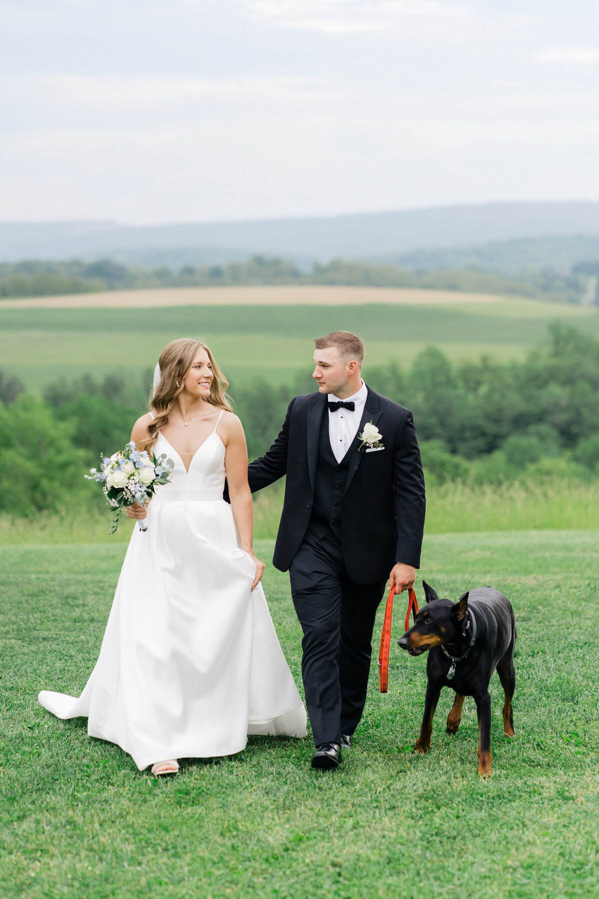 couple-with-dog-company-stables