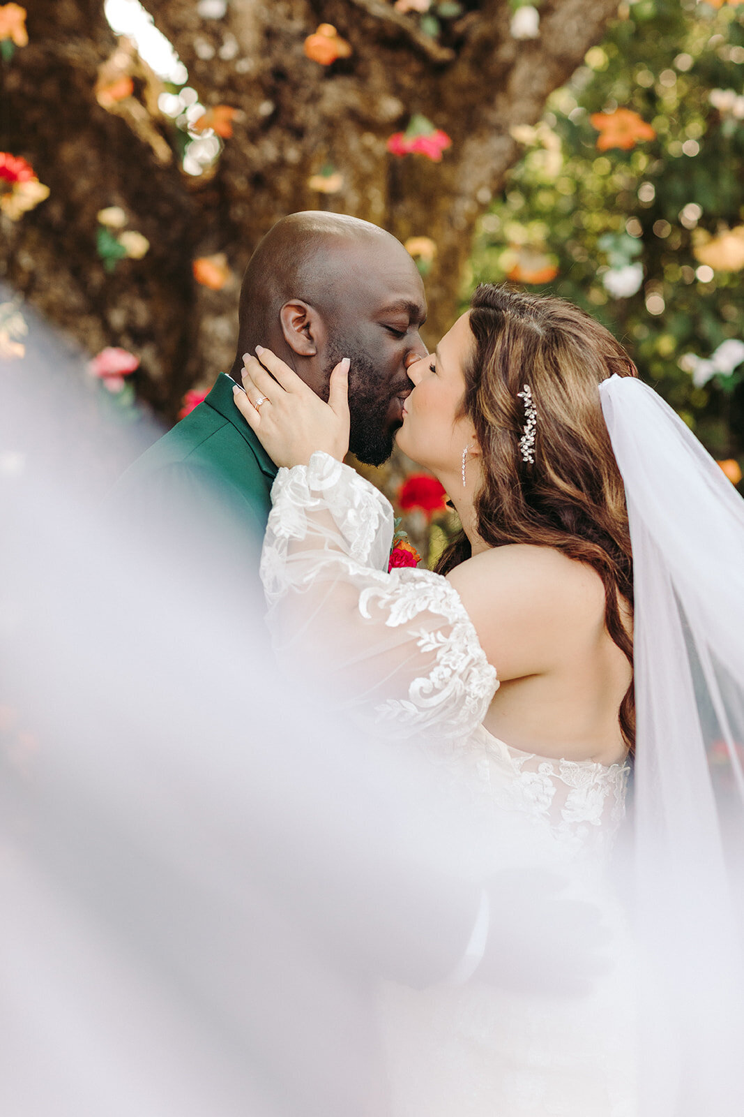 Utah Wedding Photography capturing couple kissing after intimate Spring wedidng