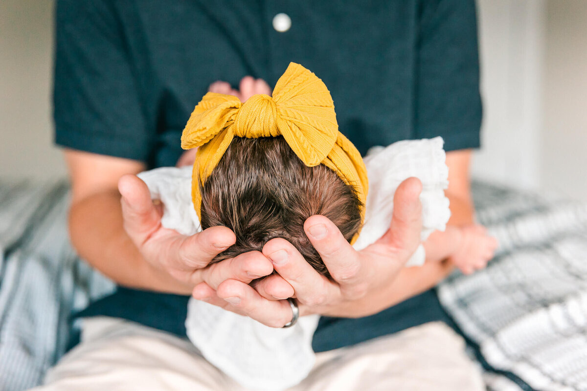 Dad holding baby