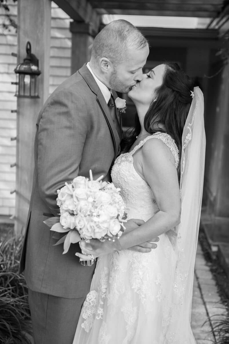 Black and white wedding portrait of bride and groom