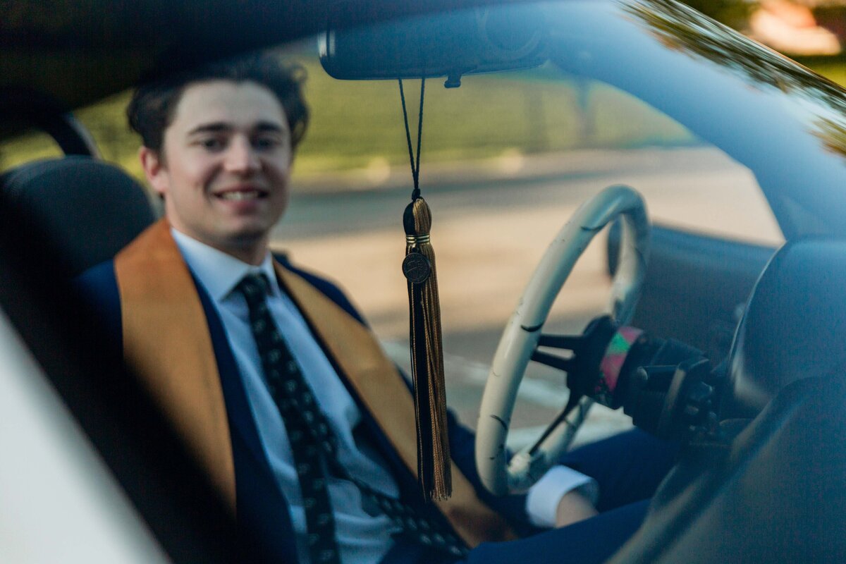 college graduation photography in car