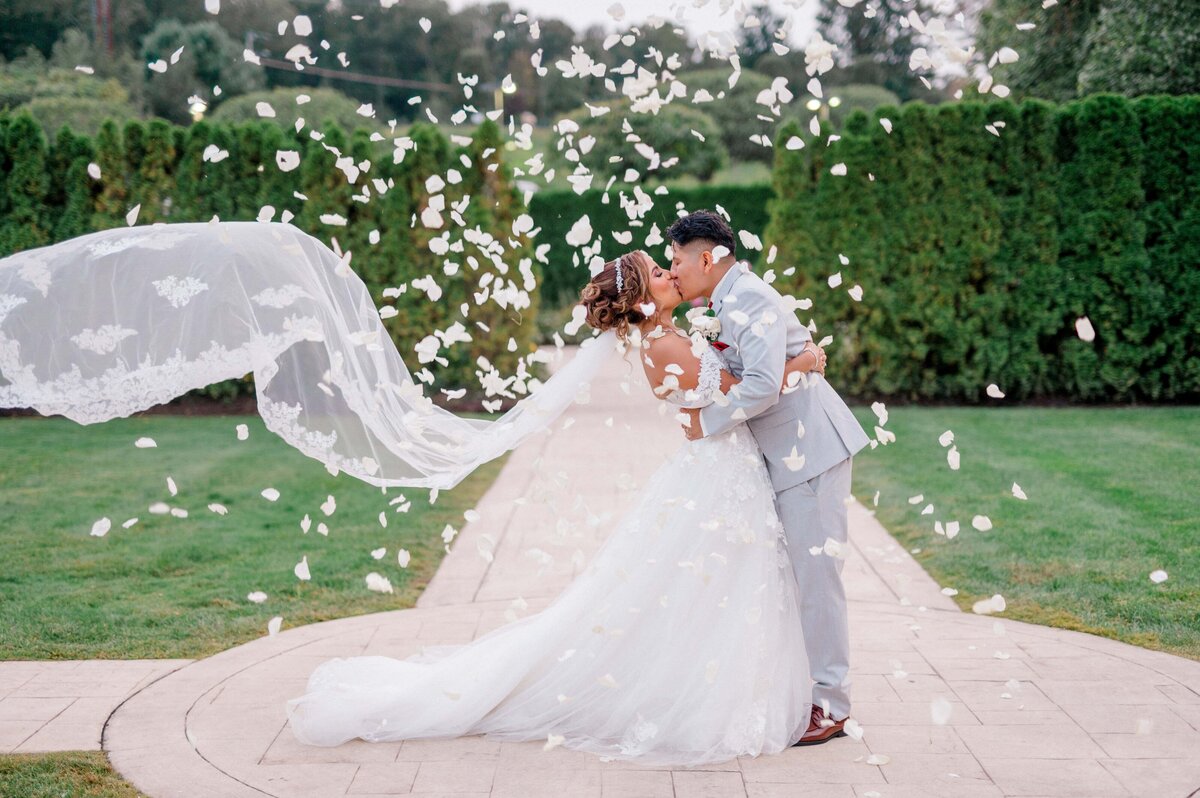 CT-Wedding-Photographer- Mexican-Wedding-Kissing-With-Flowers
