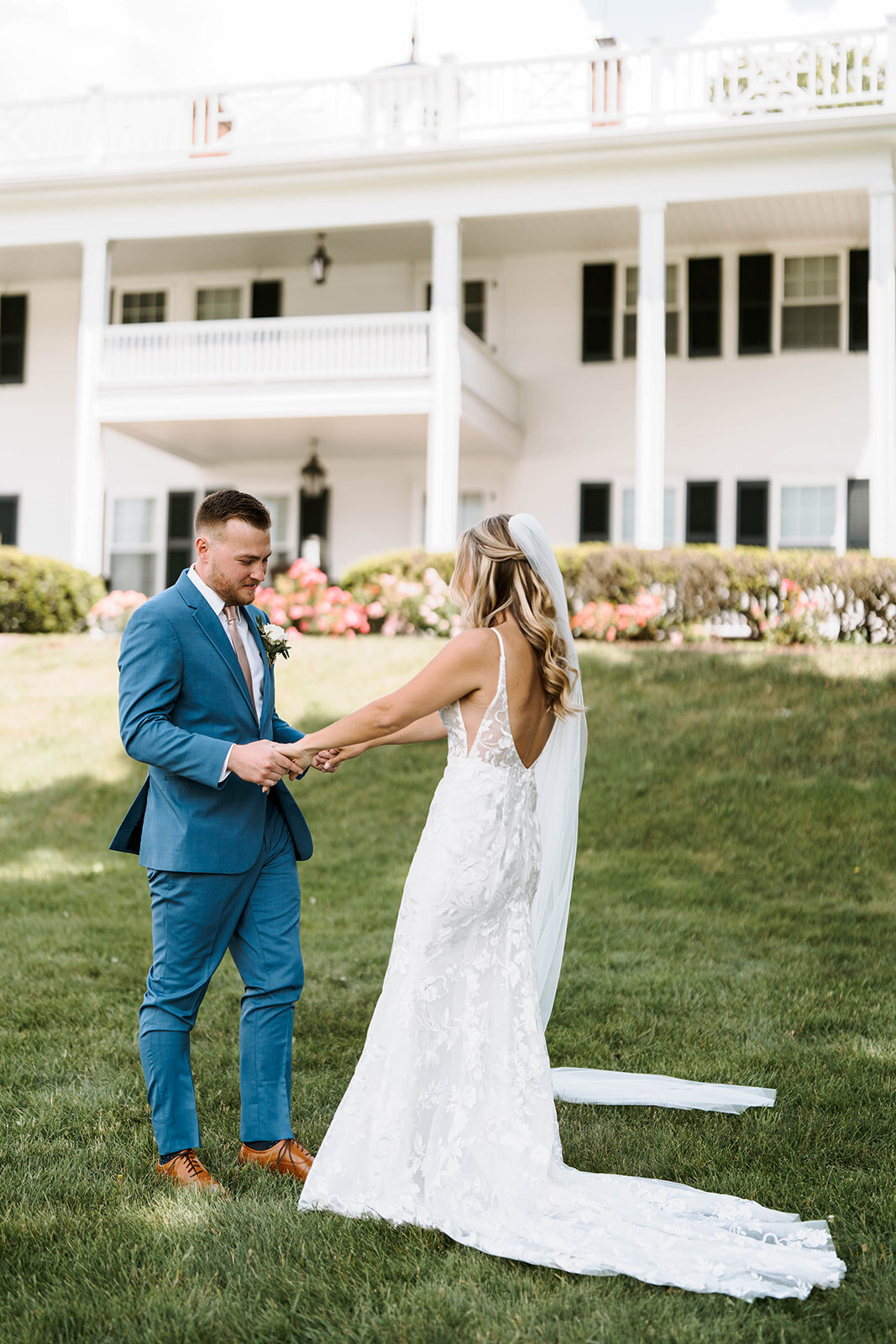 bride and groom first look outdoors at upstate new york wedding venue