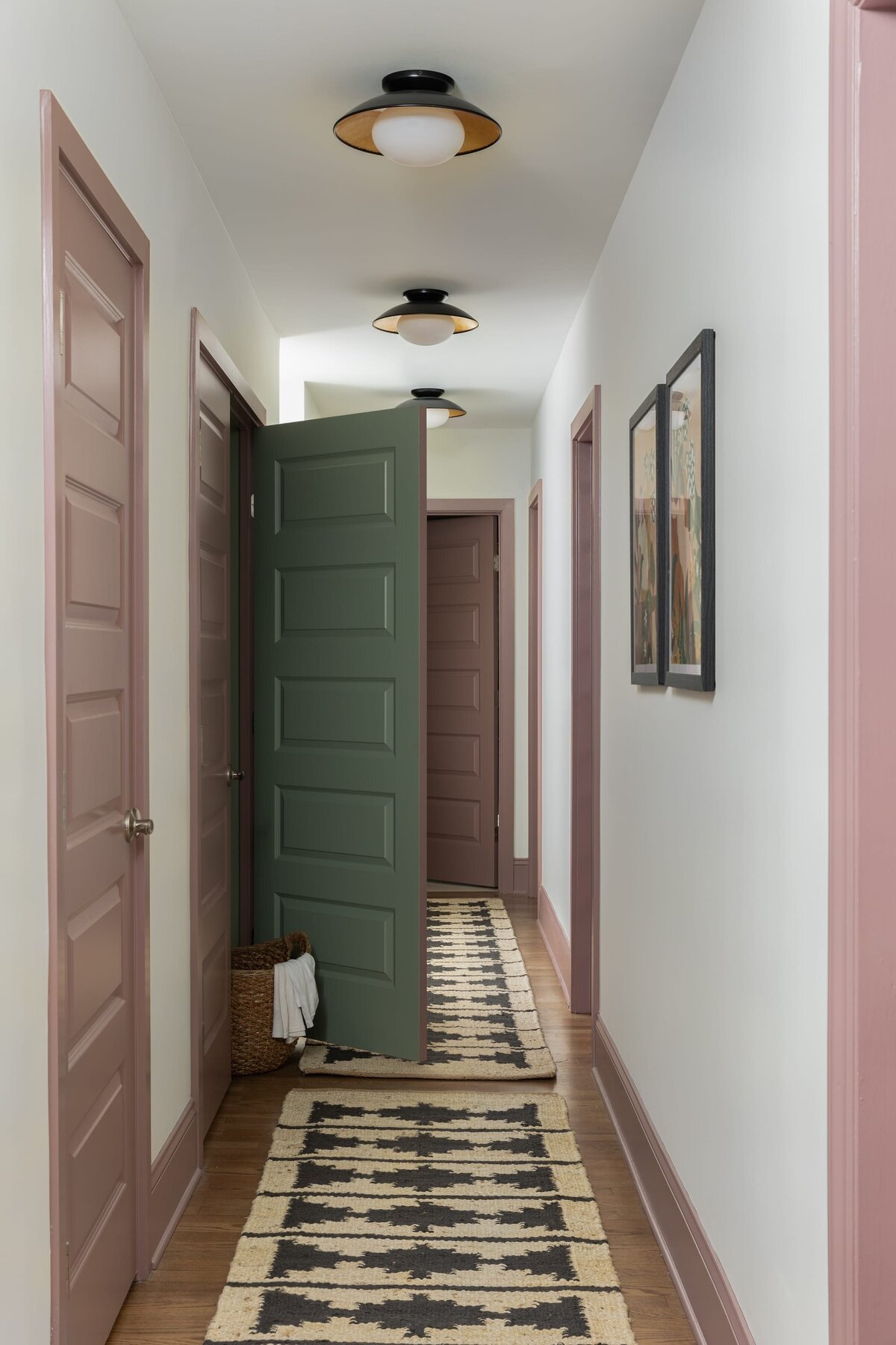 melinda chesson interiors murrayhill road colorful hallway green and pink doors statement lighting