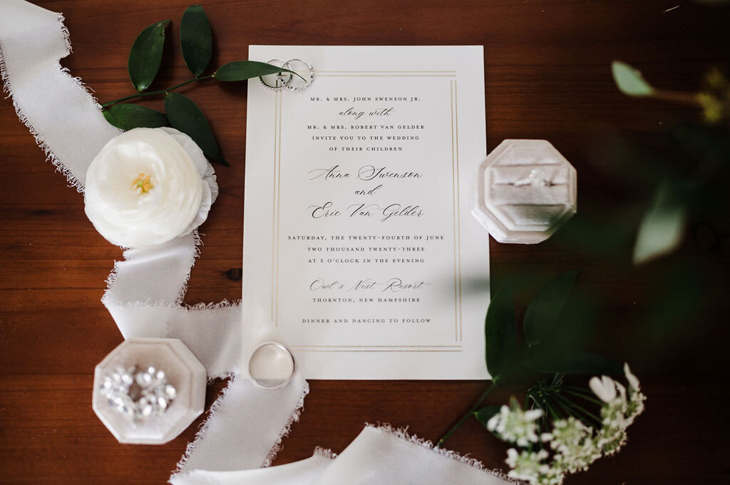 Invitation with flowers and ribbons