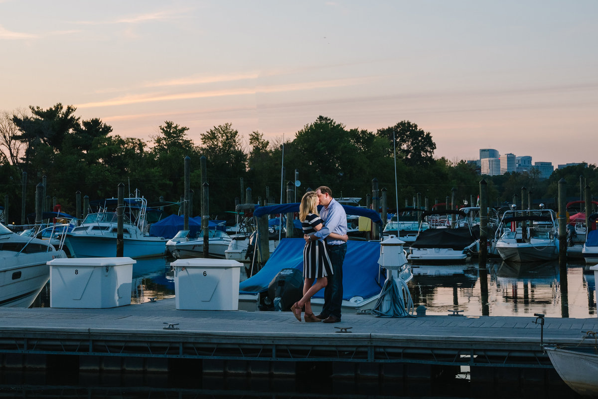 boat dock engagement session after sunset