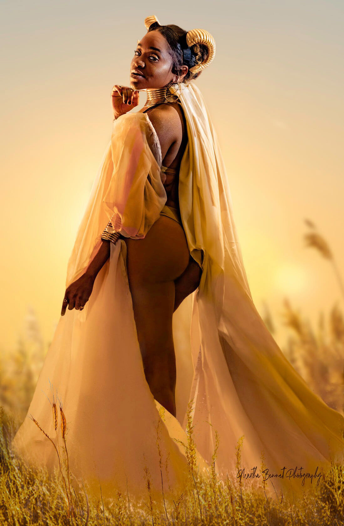 JSOUL MORGAN GOLDEN GODDESS STANDING IN FIELD