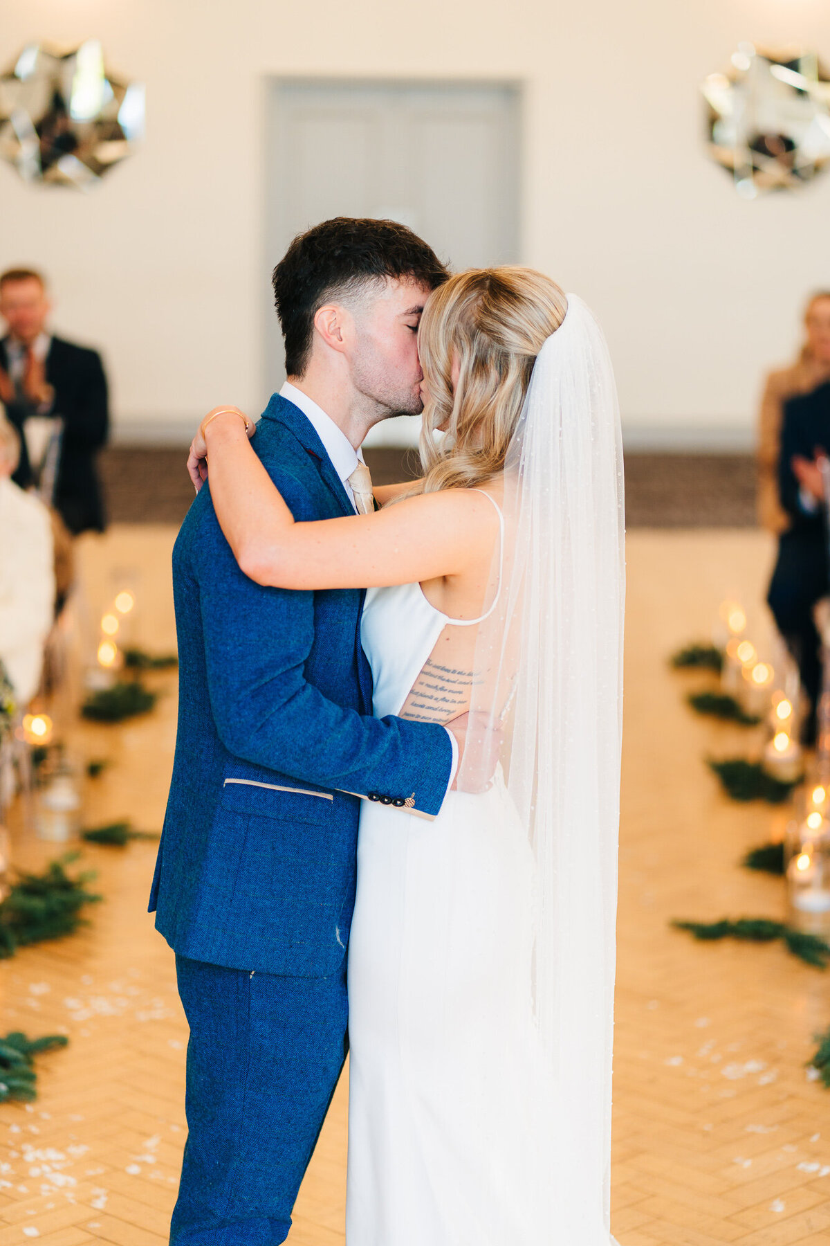 Bride and groom kissing fore the first time as husband and wife at Mytton Fold Hotel taken by Anthony Horseman wedding photographer