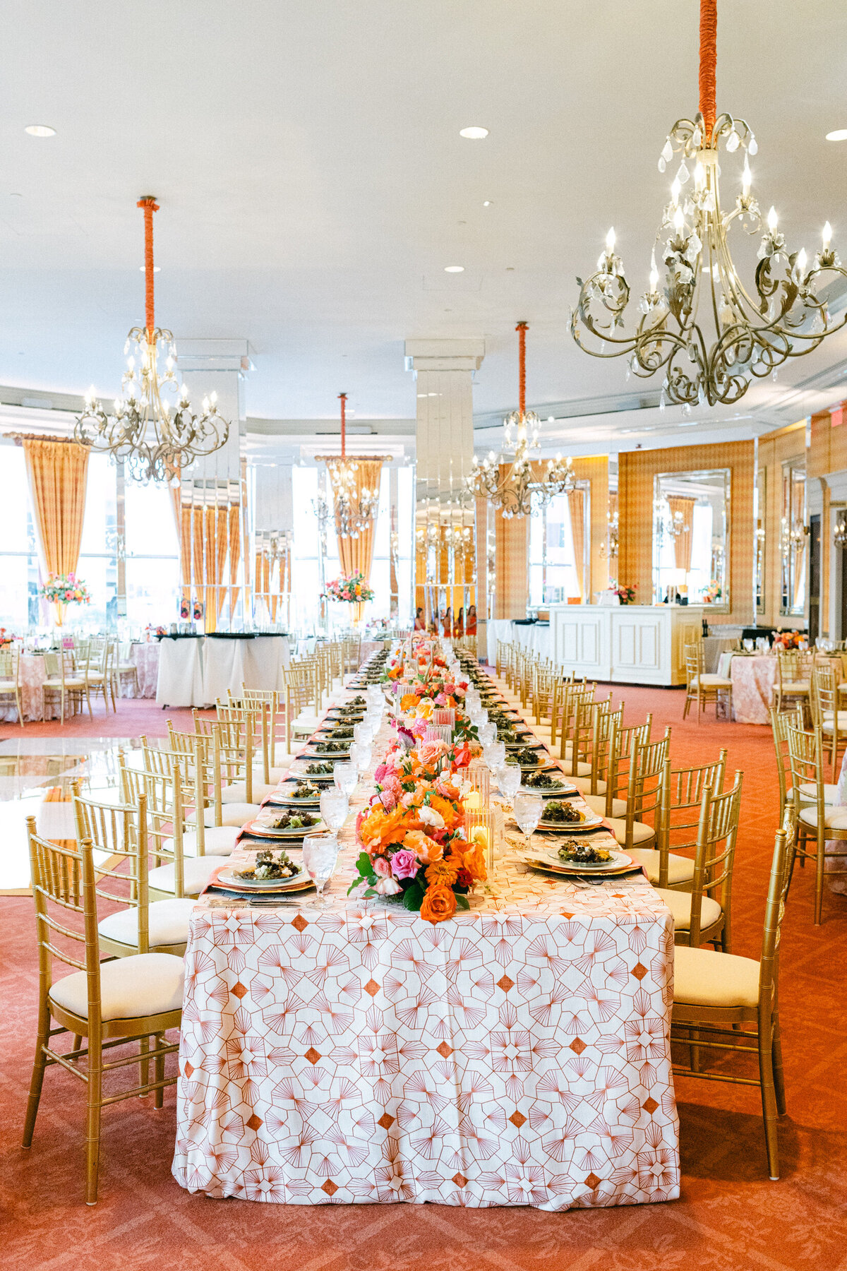 A wedding day photo of the reception hall and tables
