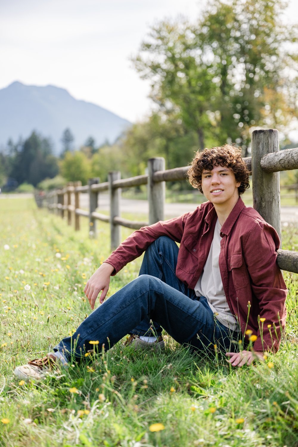 mount si high school guy at park next to fence