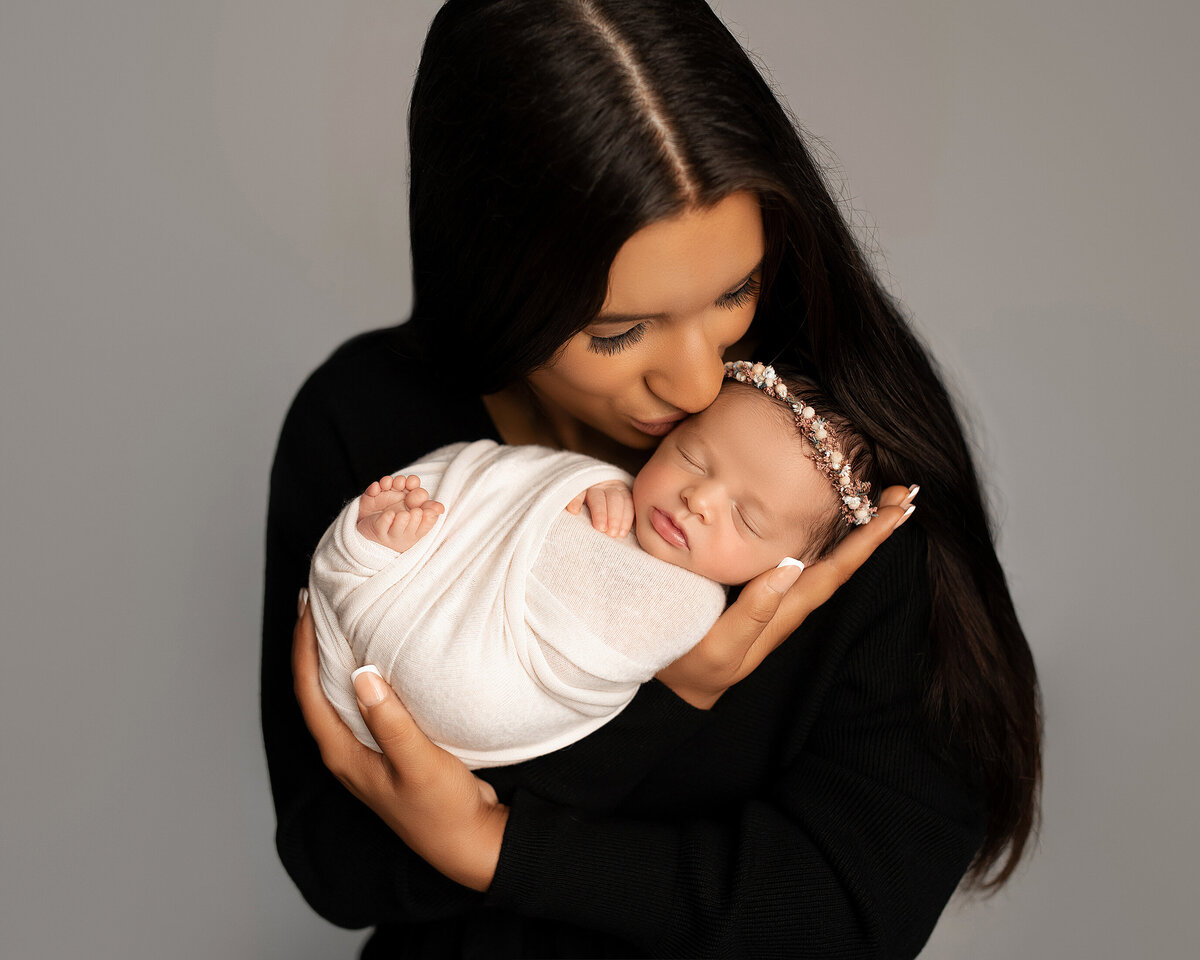 Syracuse photographer, newborn, baby, props, newborn photoshoot, photography, belly, backdrop, studio, white, black, headband, tieback, headband, floral
