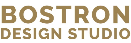 Primary logo for Bostron Design Studio in a gold color. Bostron Design Studio is a website and branding design studio for photographers.