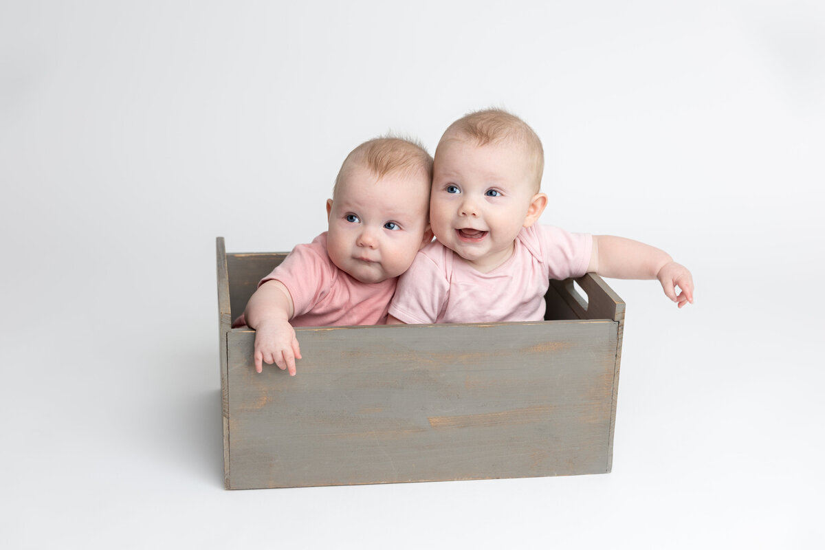 Twin sisters studio portraits