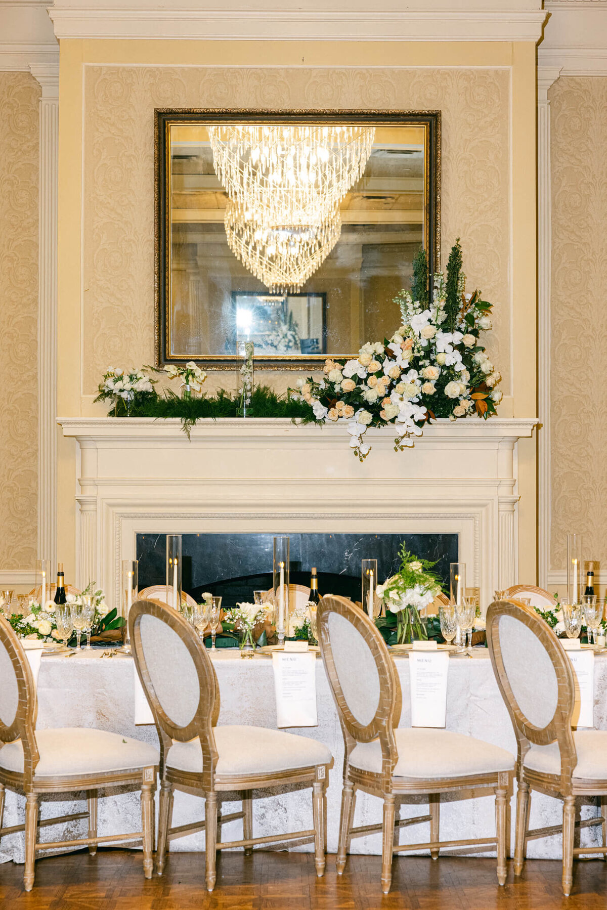 A wedding day photo showing off the tables in the reception hall for the wedding