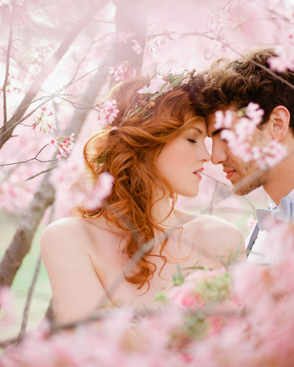 romantic spring wedding cherry blossoms sweet moment red head engagement candid serene blush tones