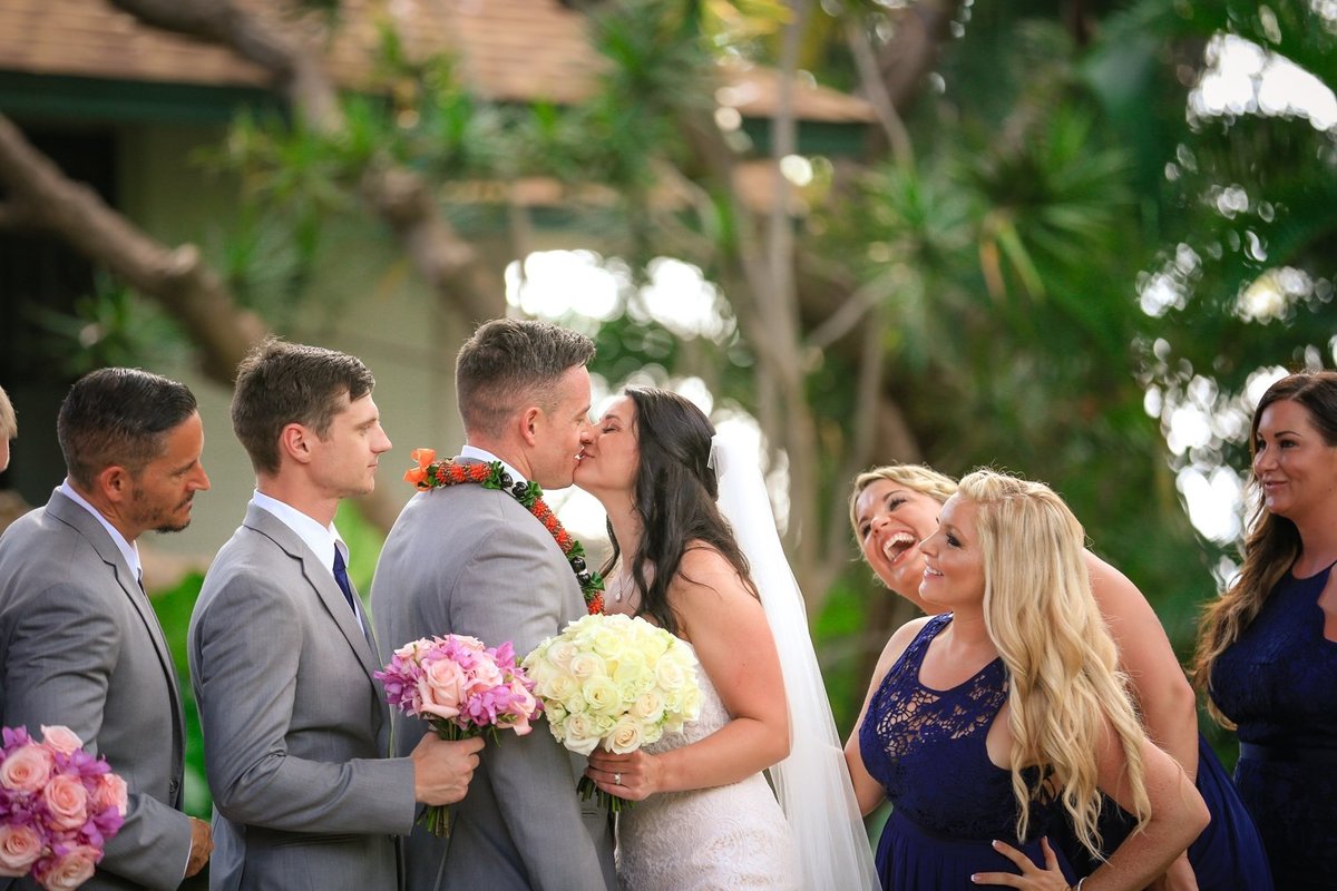 Capture Aloha Photography at The Westin Maui Resort and Spa with Newly Wedding Kissing with Bridesmaid and Groomsmen