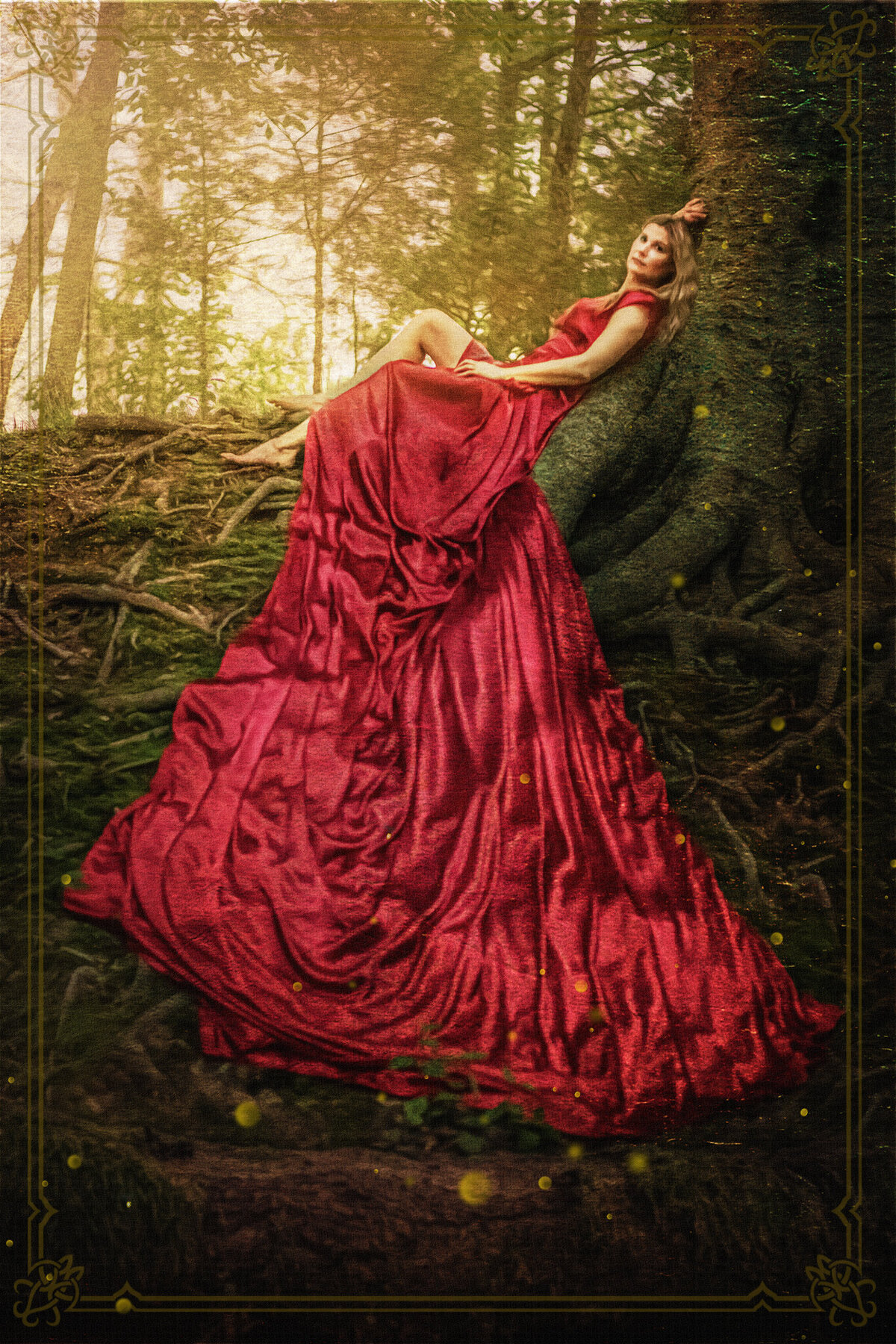 Fairy tale like portrait of a woman in a long trained red dress looks like a painting.
