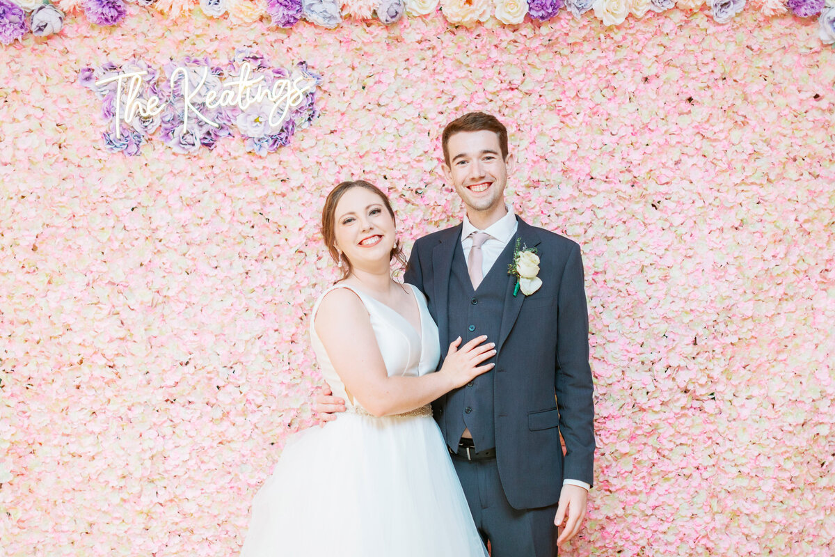 Wedding-Couple-at-wedding-backdrop