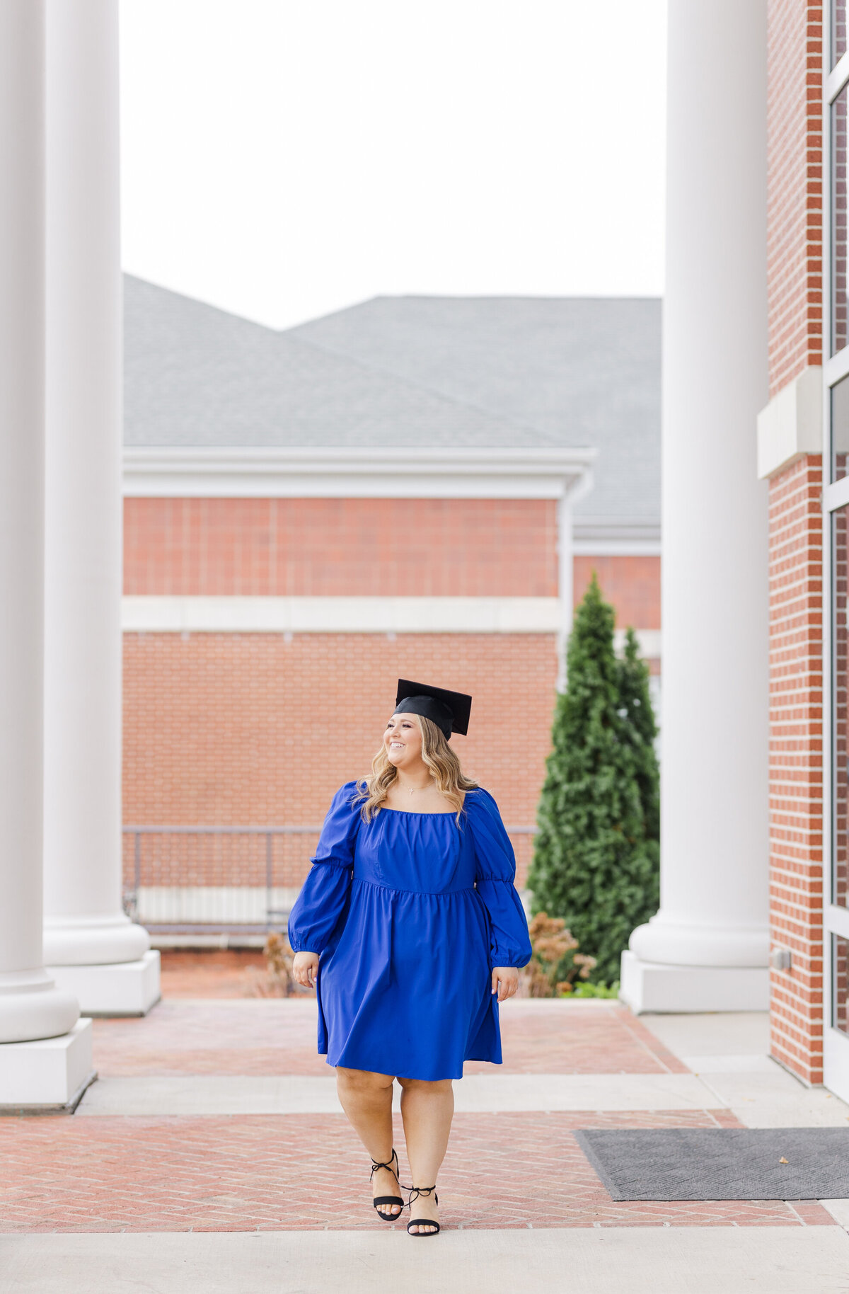 college senior walking on campus in Cleveland, TN