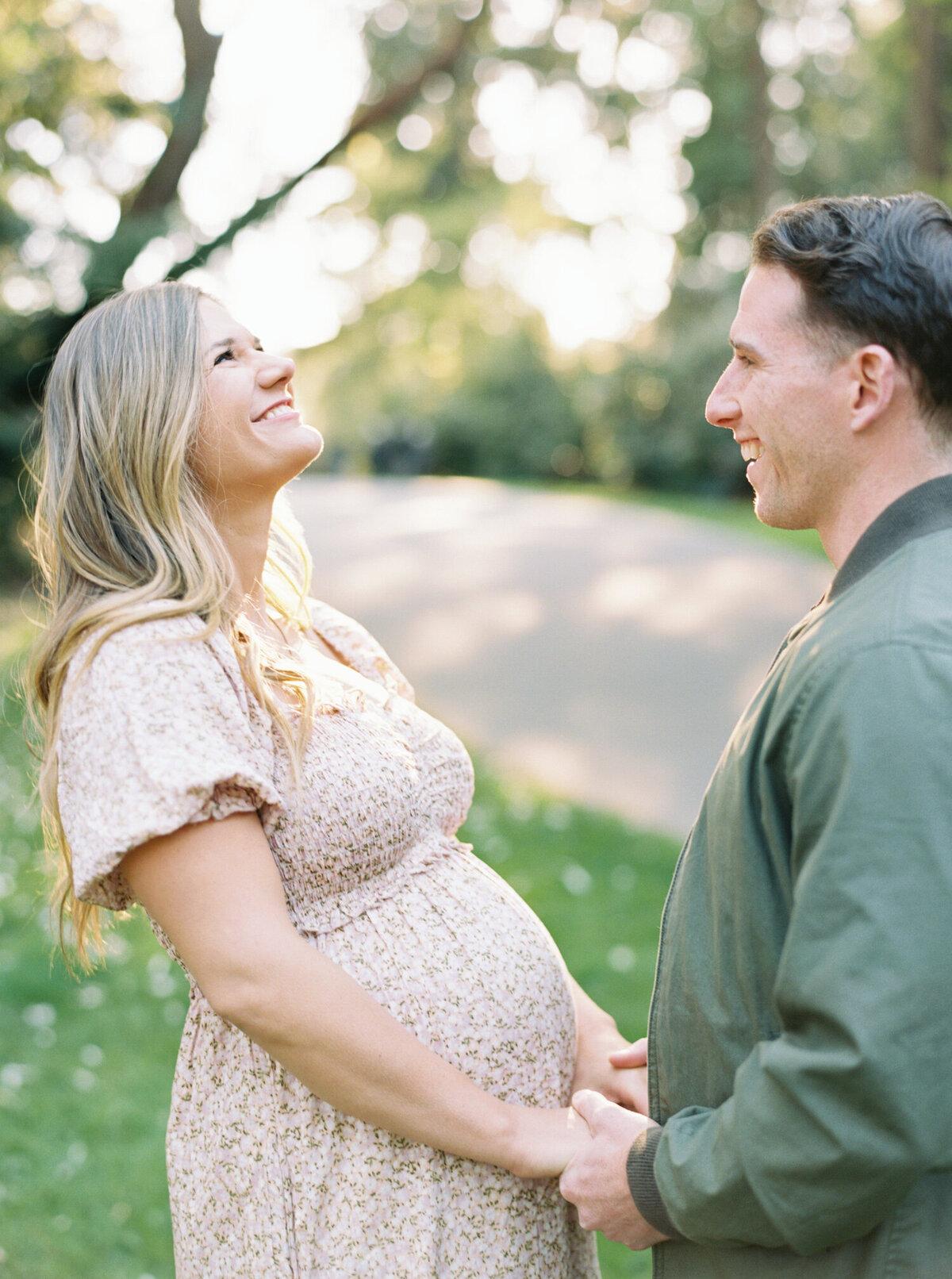 spring film photos of couple in park shot by Seattle Maternity Photographer