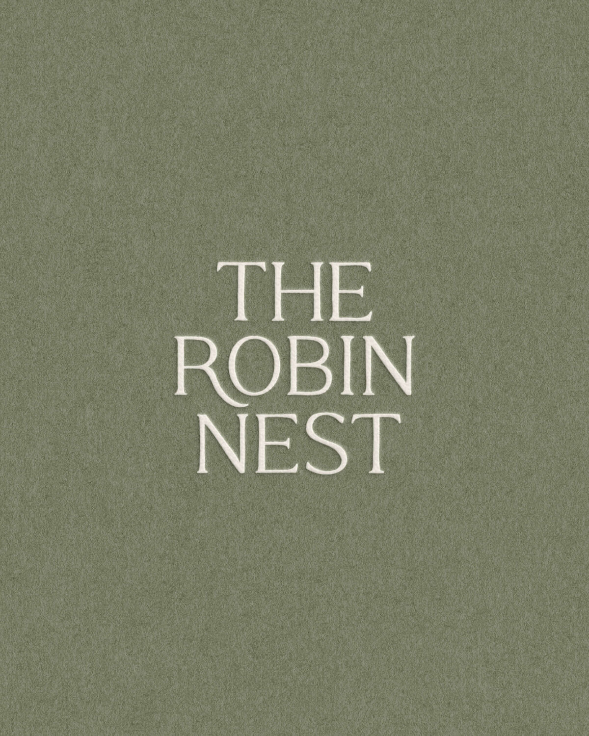 Minimalist logo with elegant serif typography on a trending olive green background, ideal for boutique lifestyle brands.