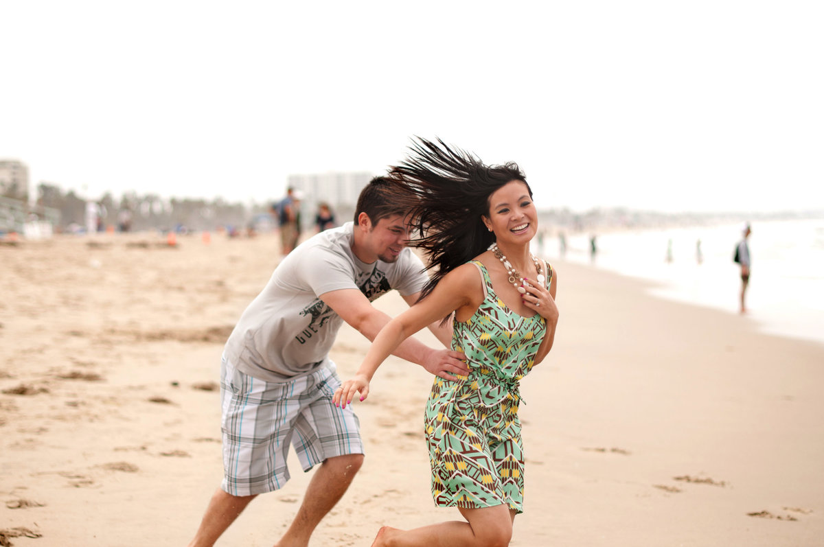 Malibu engagement photographer for the fun couples. Romantic engagement photo in Malibu. Southern California state beach engagement photo. West Los Angeles Beach engagement photo.