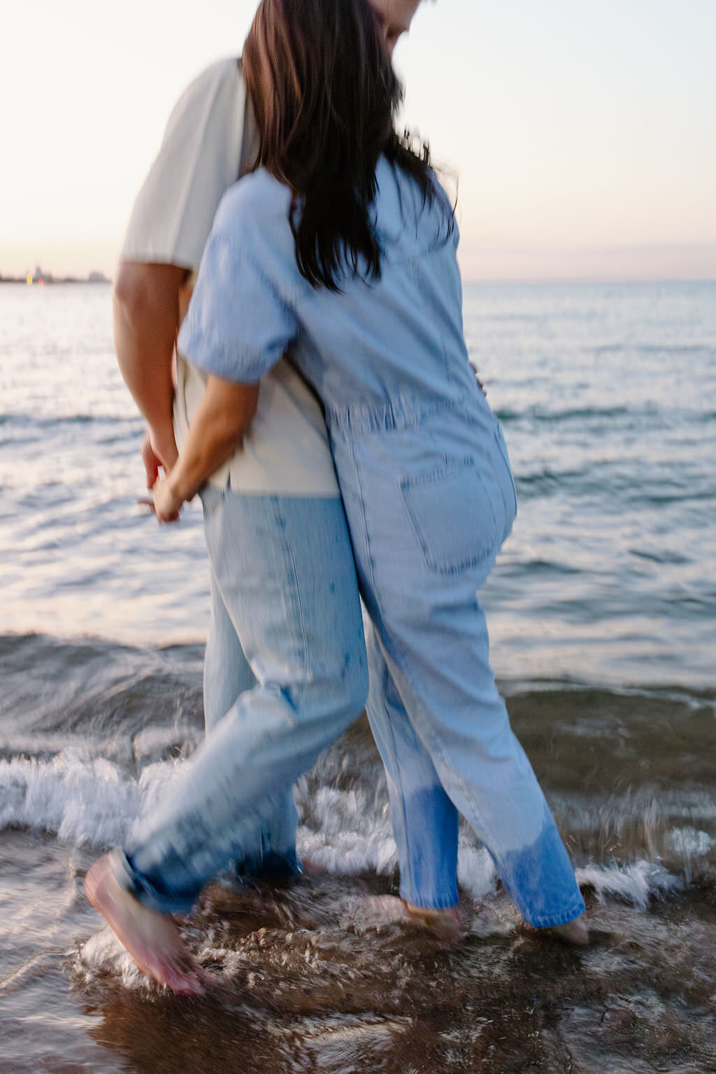 An engagement photography session at The Wrigley Building and North Ave Beach in Chicago, Illinois - 41