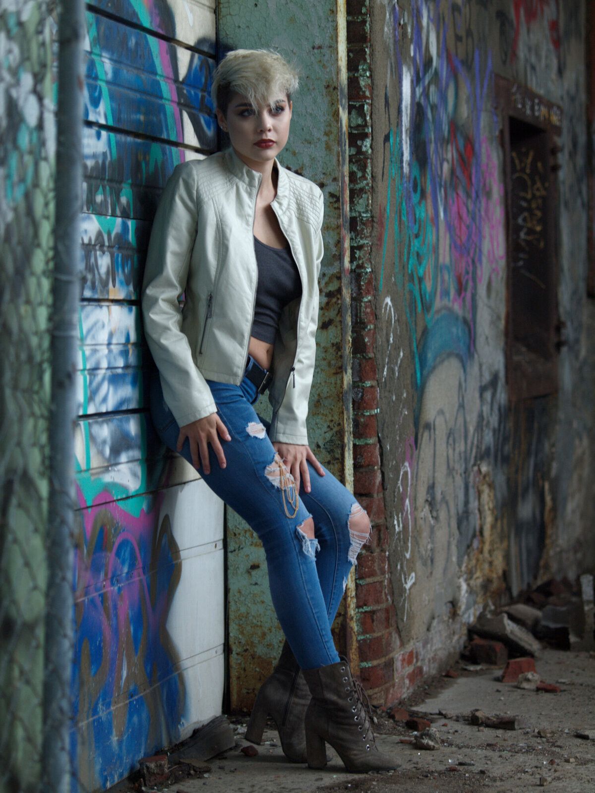 girl with graffiti outdoor daytime portrait