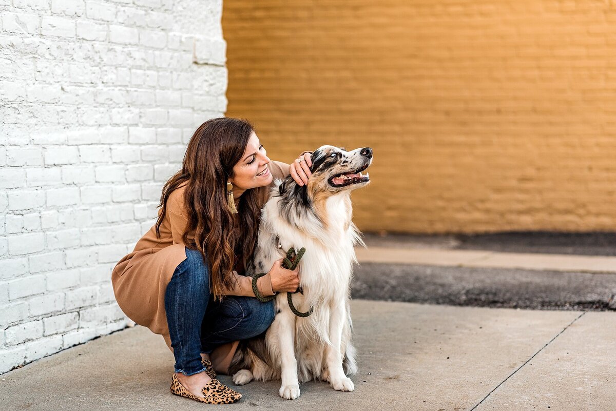 woman and dog in urban setting