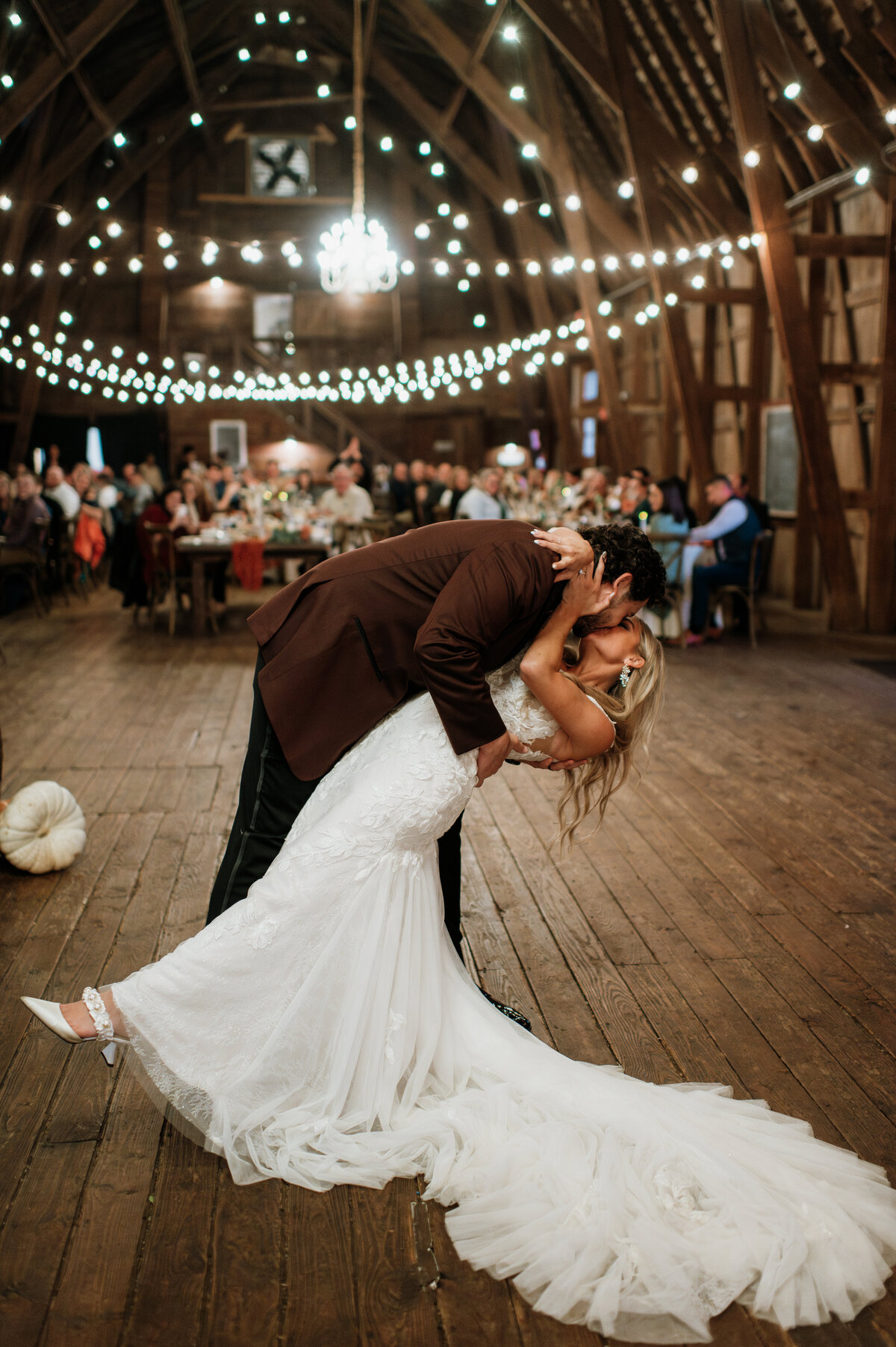 Wedding reception dancing under string lights