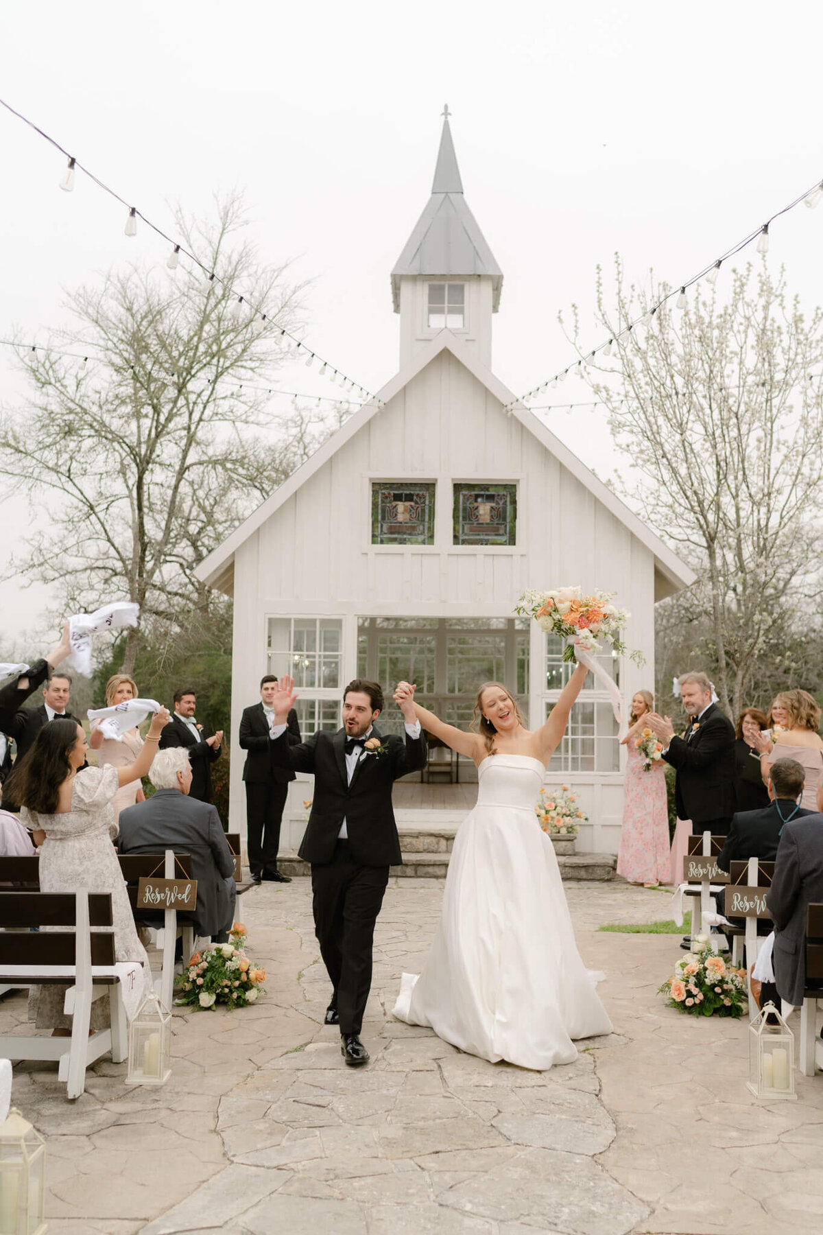 couple celebrating walking down the aisle