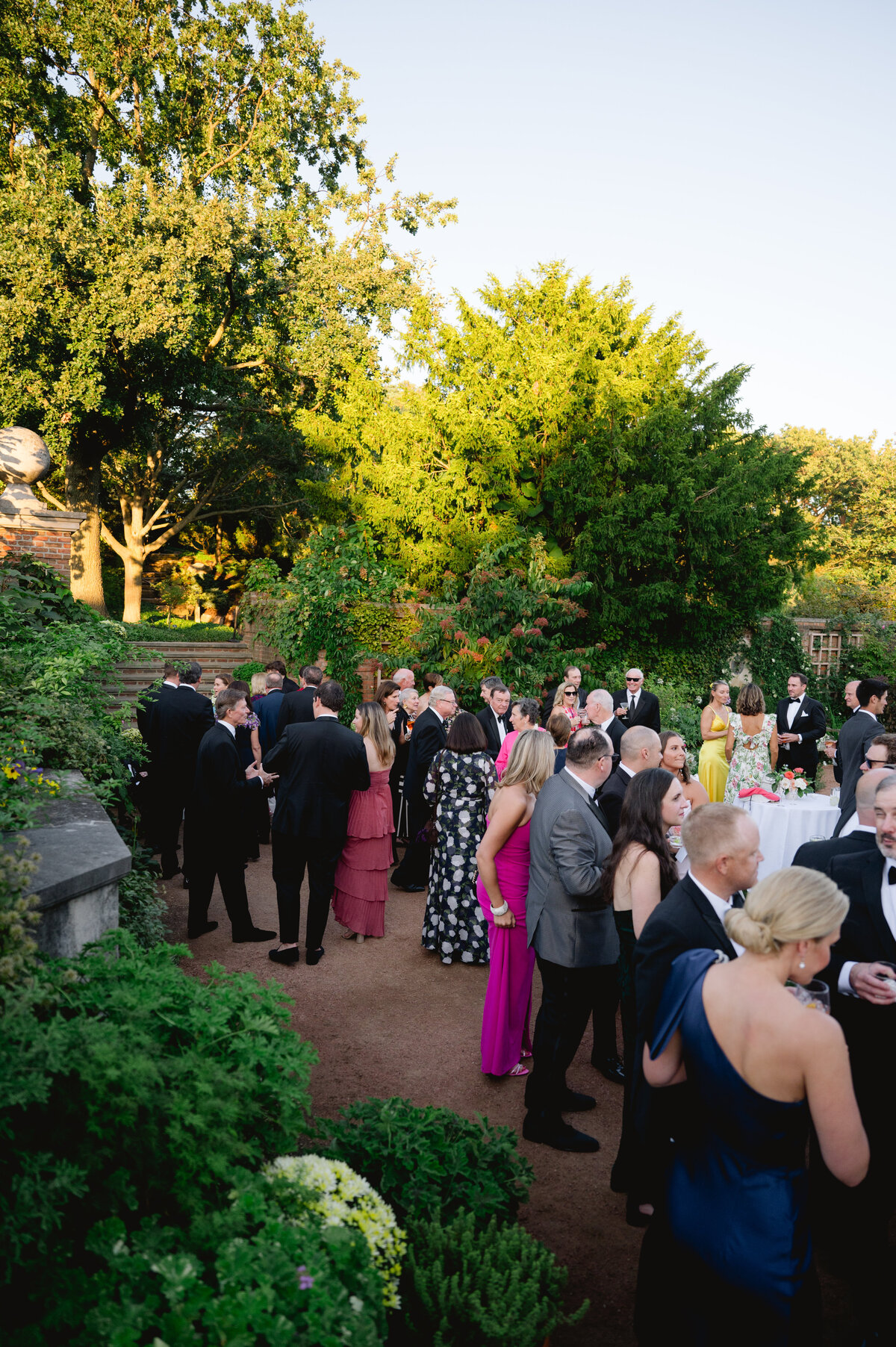 Guests mingling during a wedding reception at the Chicago Botanic Gardens