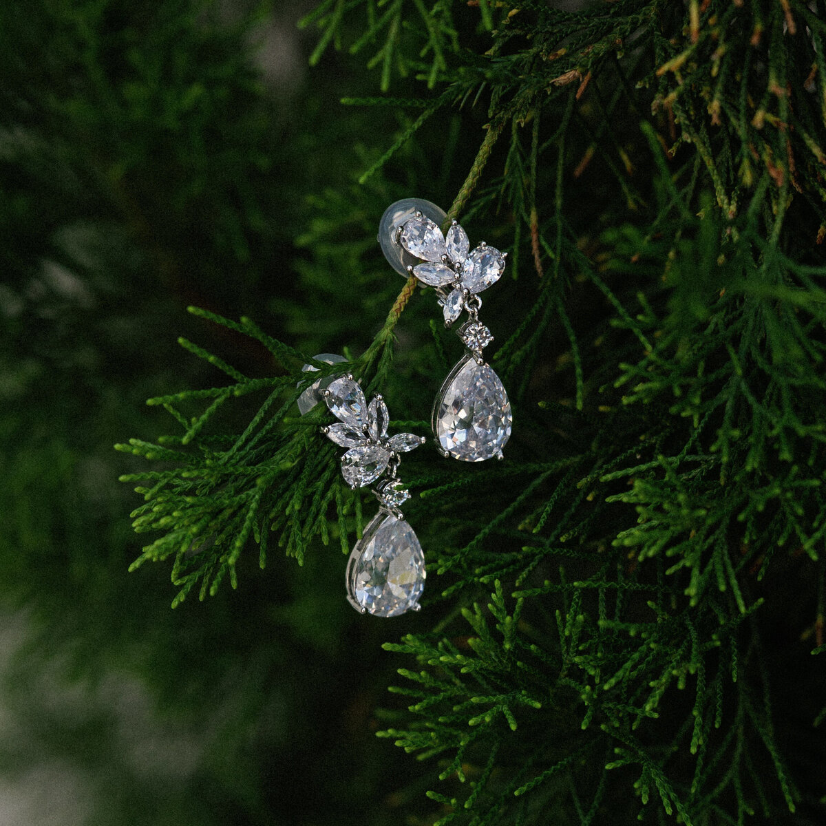 Bridal details and Earrings with white florals at La Casa Toscana