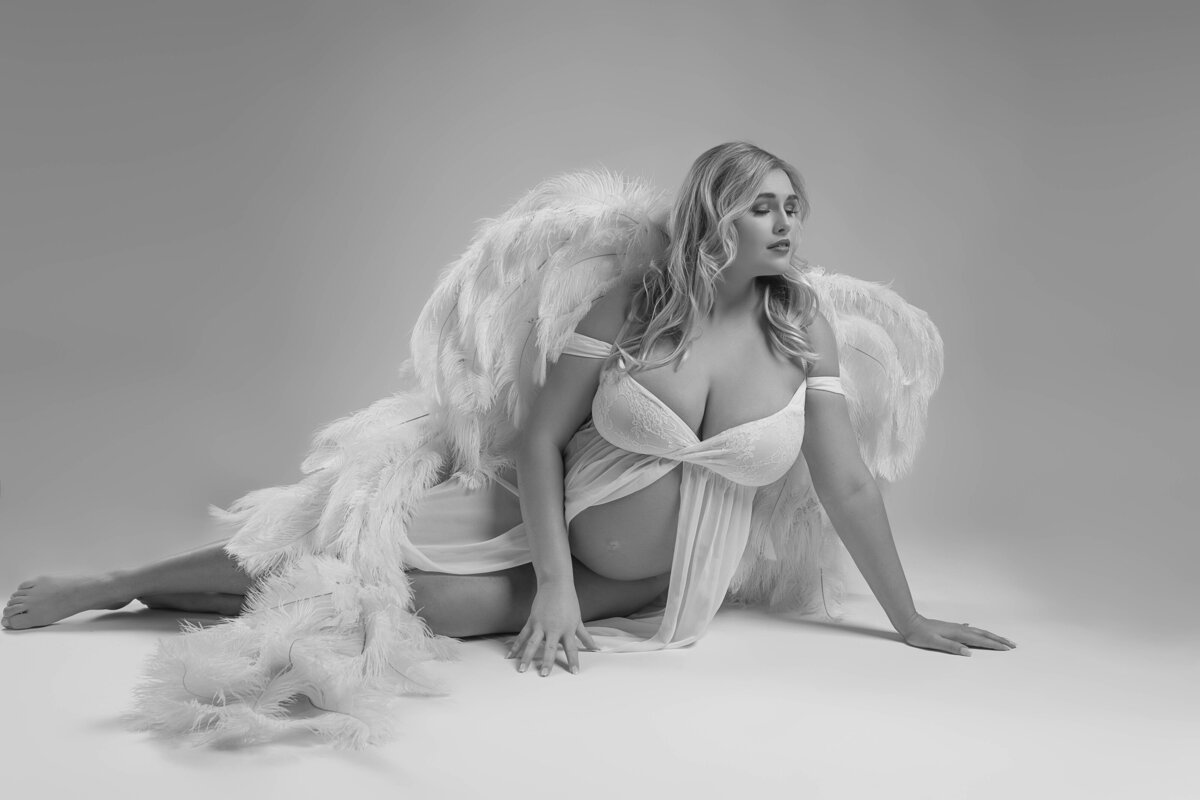 black and white angel wing maternity photograph