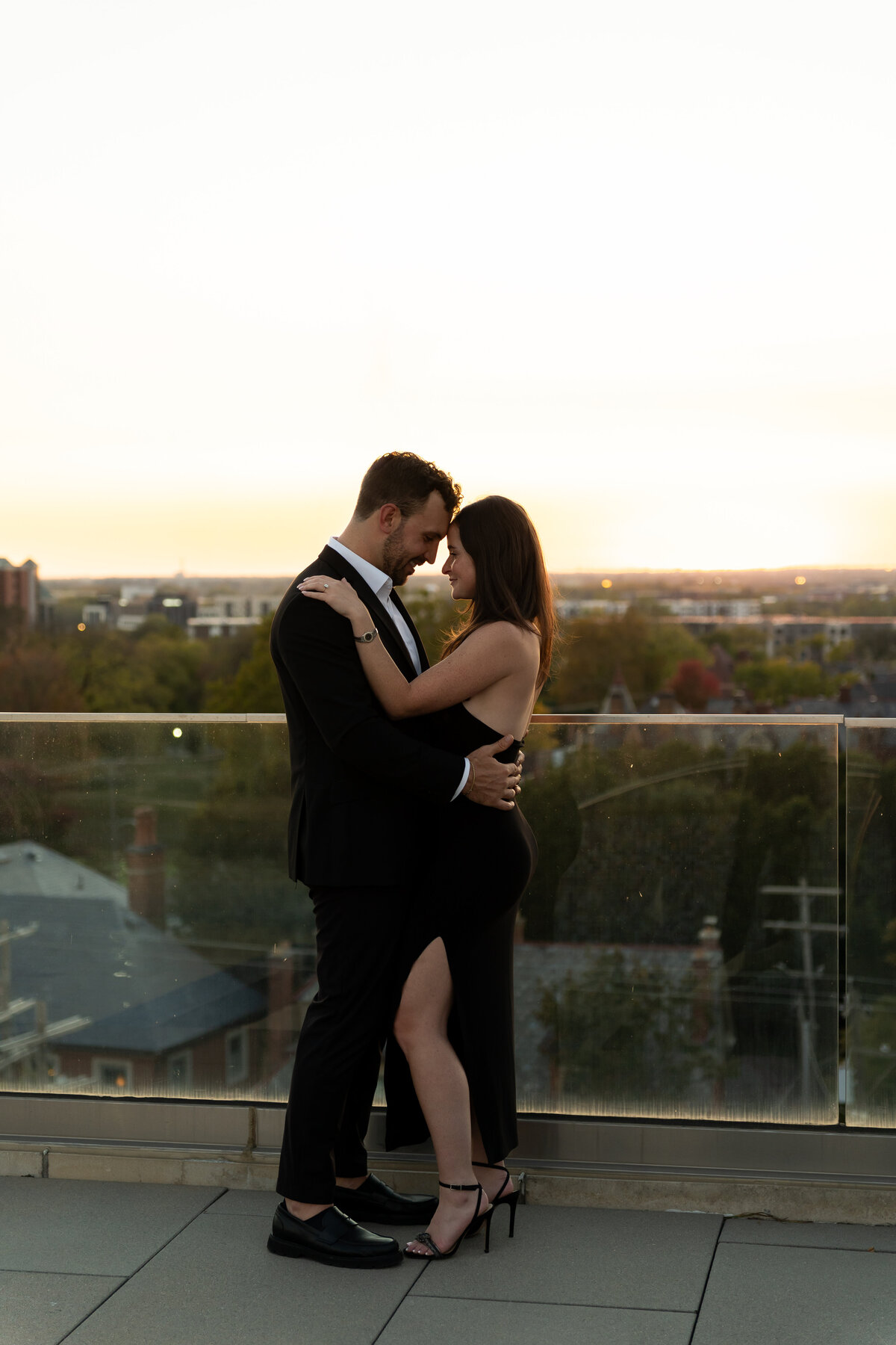 couple embracing among Columbus skyline proposal