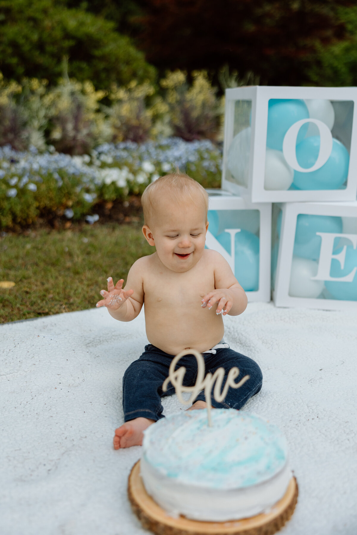 Baby's first birthday photoshoot with a smash cake