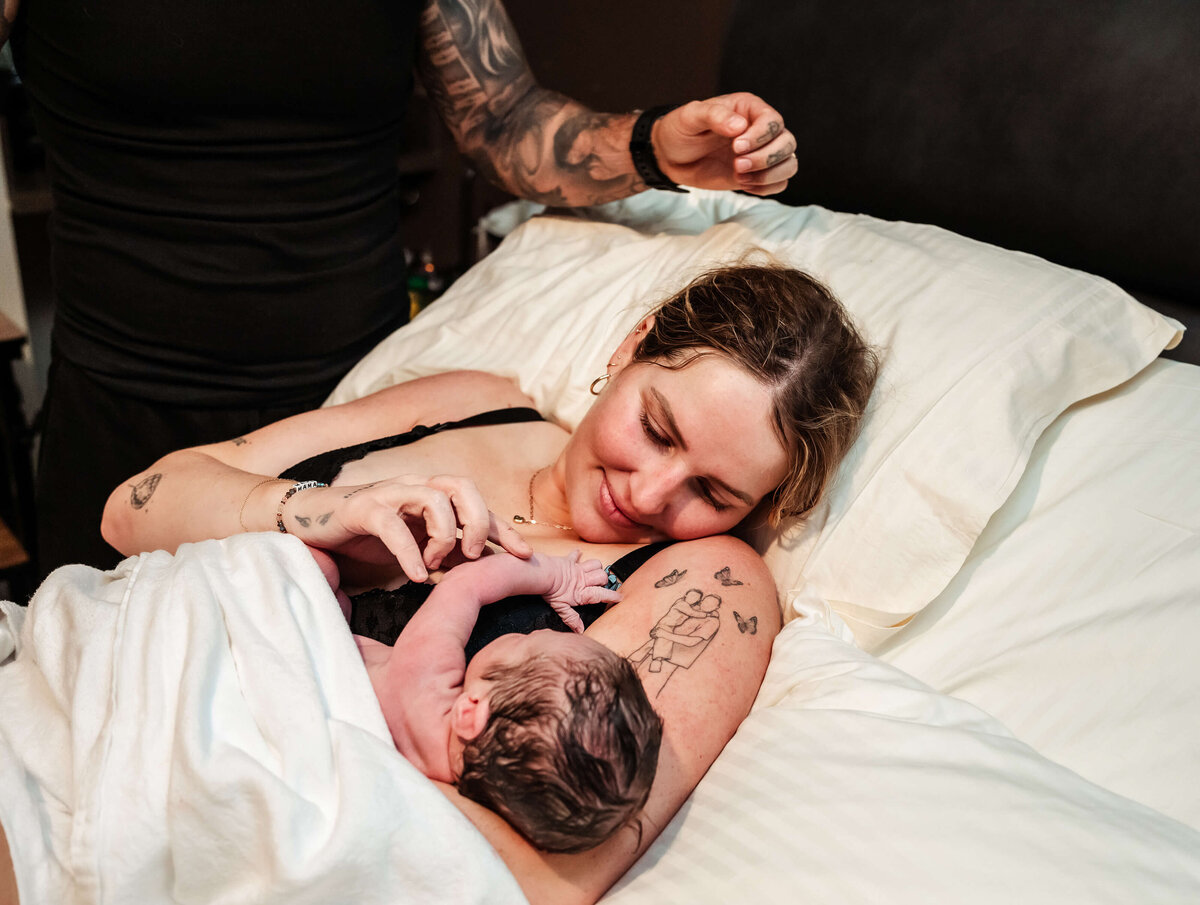 new-mother-soaking-in-details-of-her-newborn