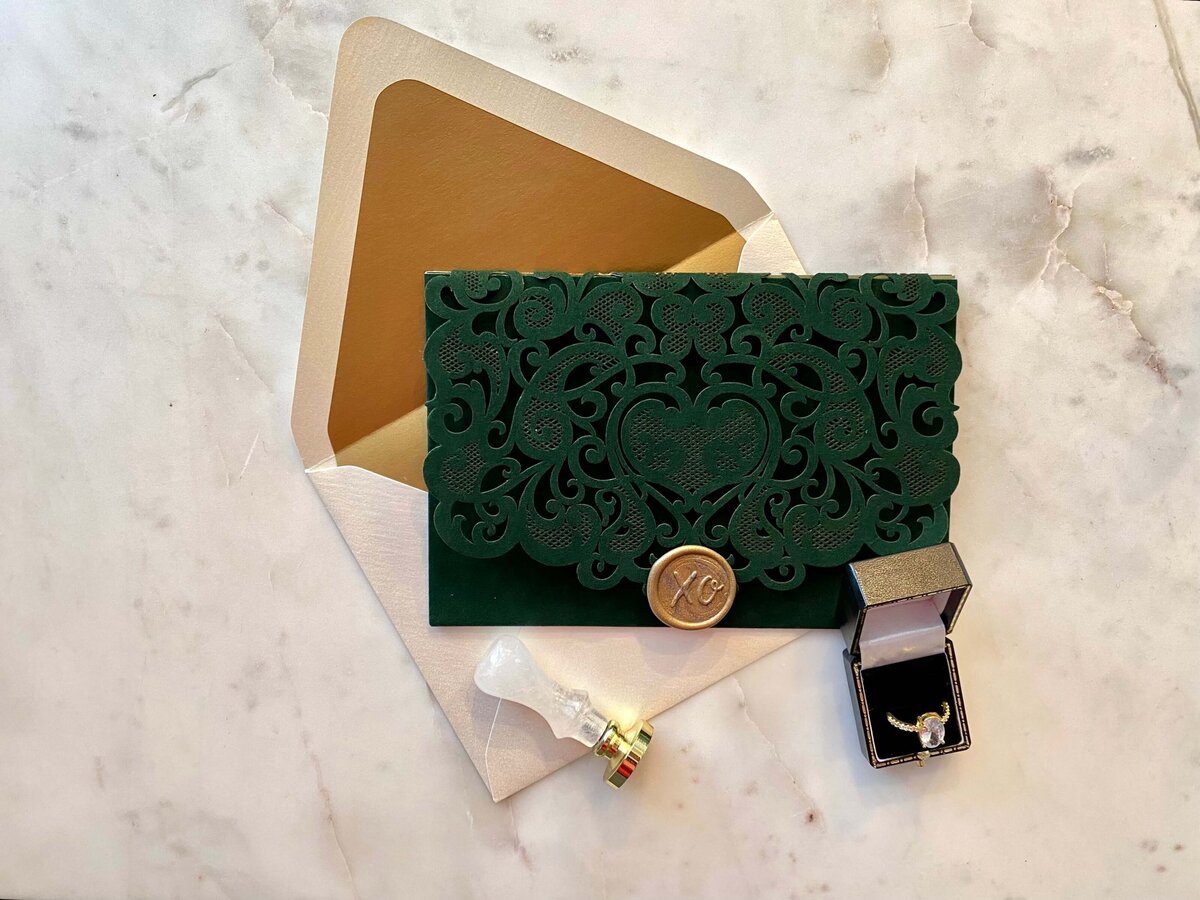 velvet-emerald-green-lasercut-wedding-invitation-gold-wax-seal