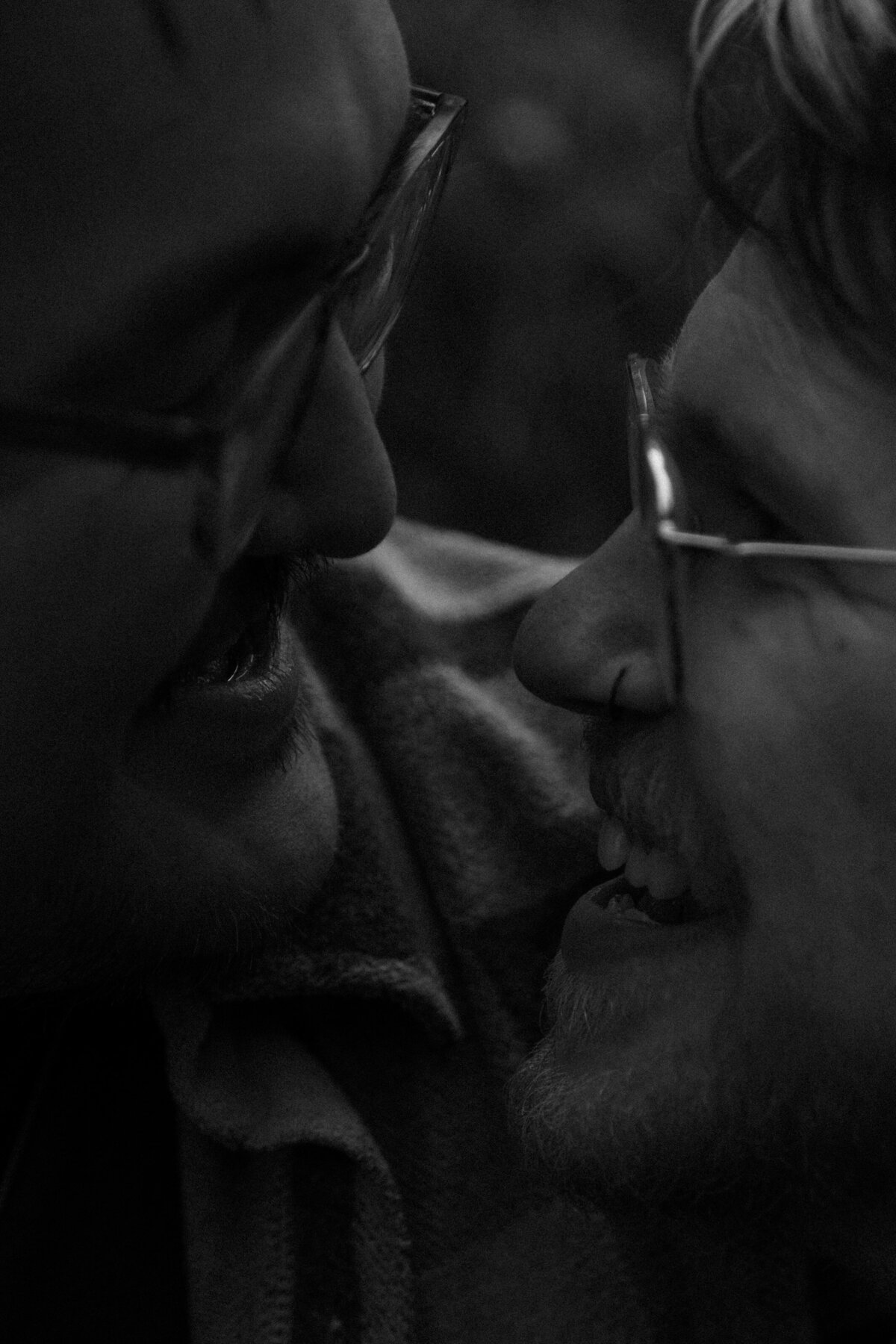 Close Up photo of couples faces 