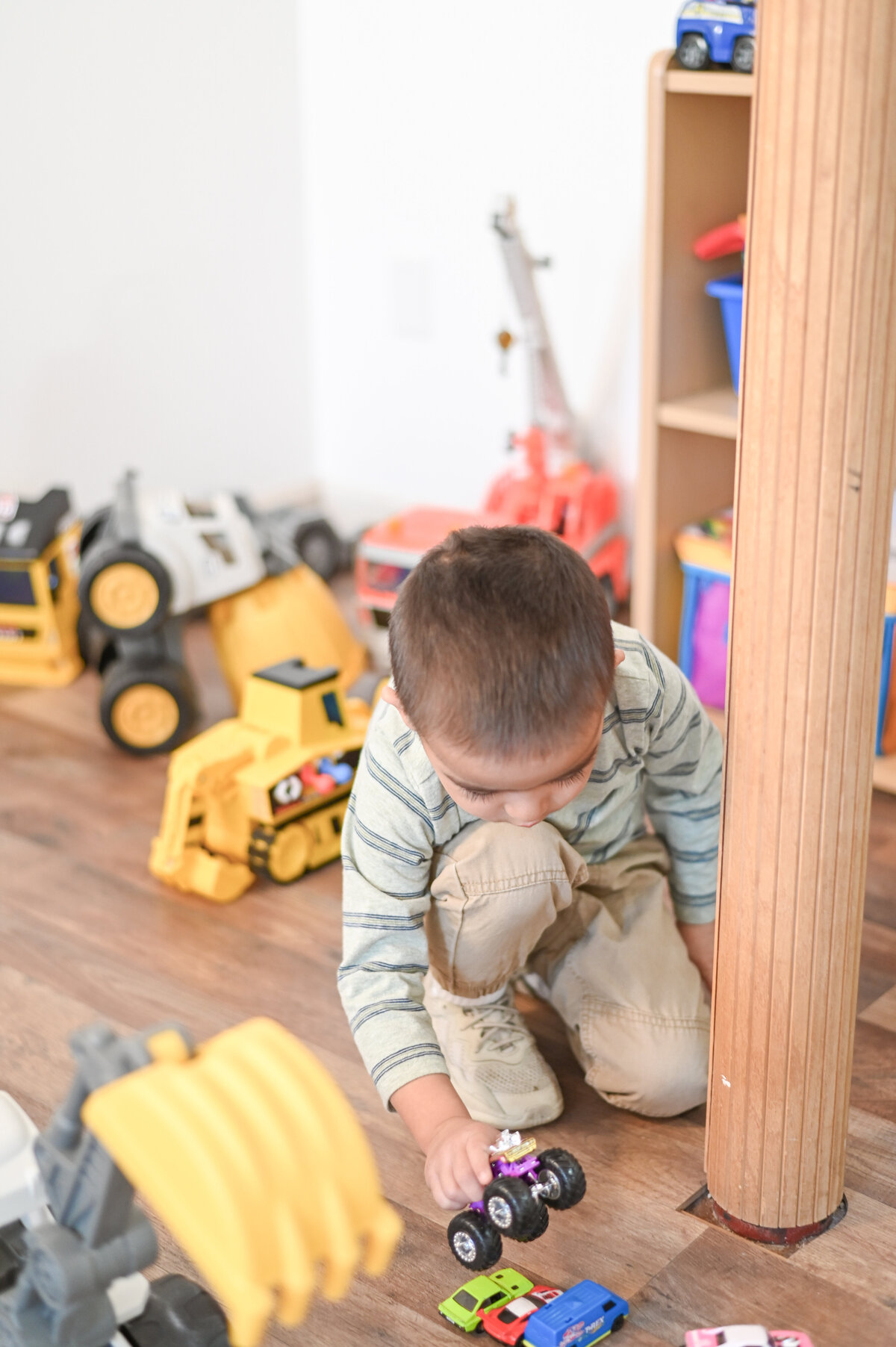 Student playing at House of Parker Preschool Gorham Maine where the magic of play helps our students grow, learn, and thrive, making every moment a joyful step in their development.