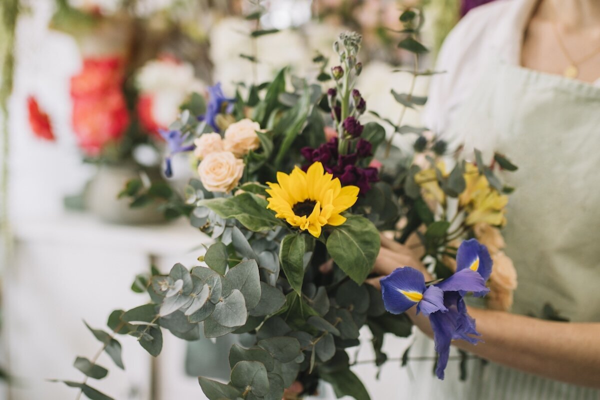 crop-florist-with-nice-bouquet