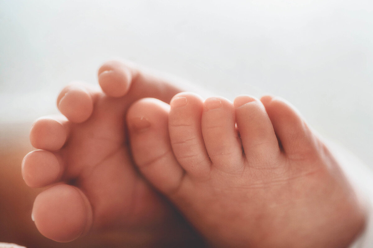 Infant posed for Newborn Photos in Charleston, SC.