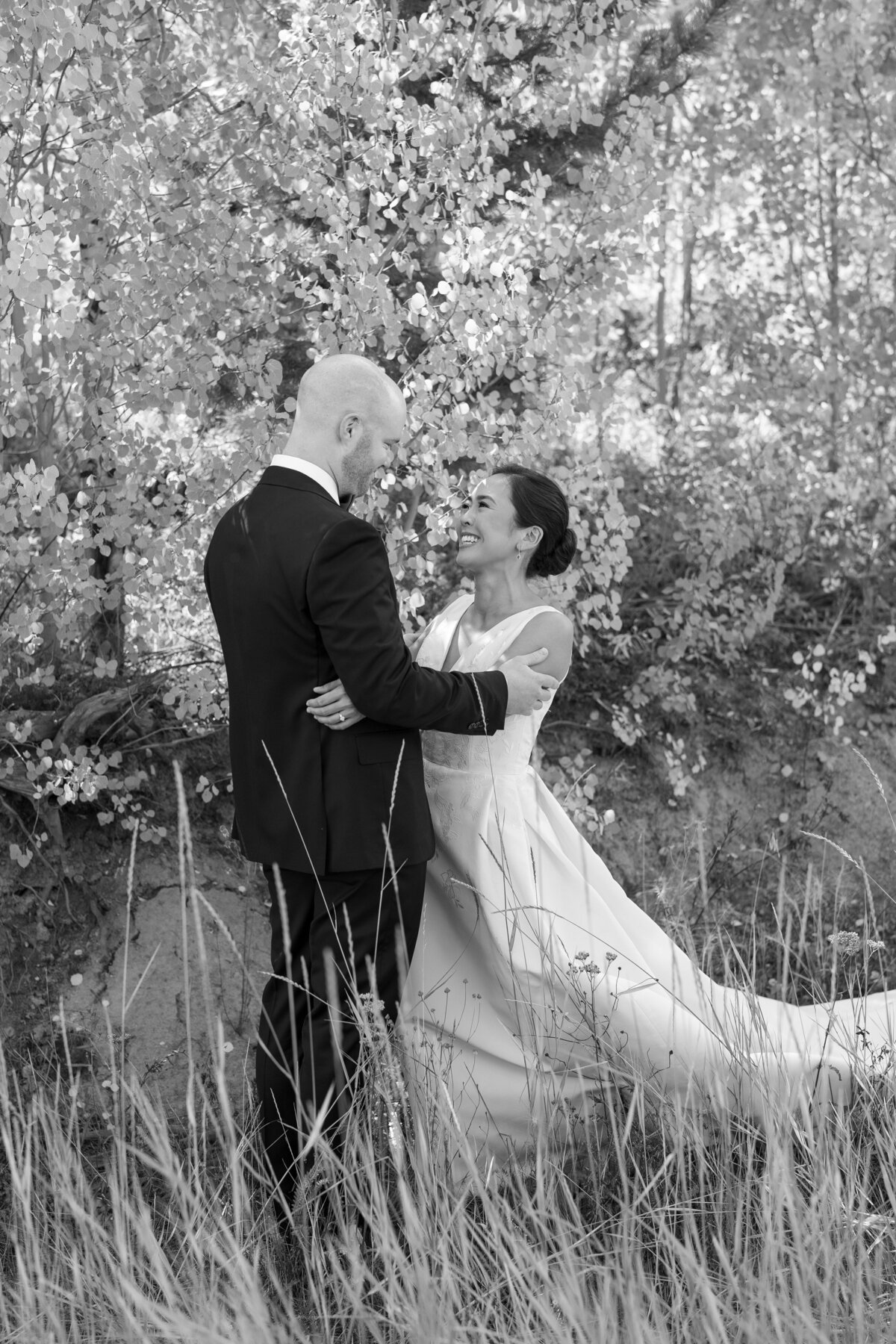 First look with bride and groom in aspens
