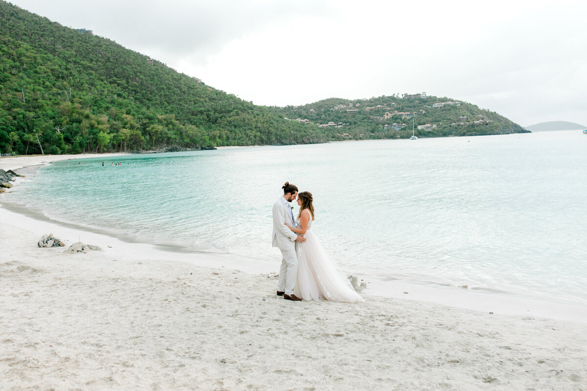 Wedding Photography, couple standing on the beach in hawaii