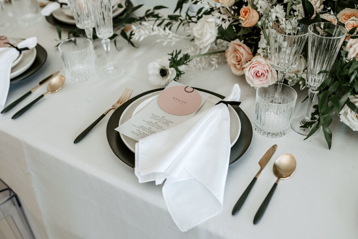 Gorgeous minimalistic white, black and pink reception decor styled by CNC Event Design, modern and elegant wedding planner based in Calgary, Alberta. Featured on the Brontë Bride Vendor Guide.