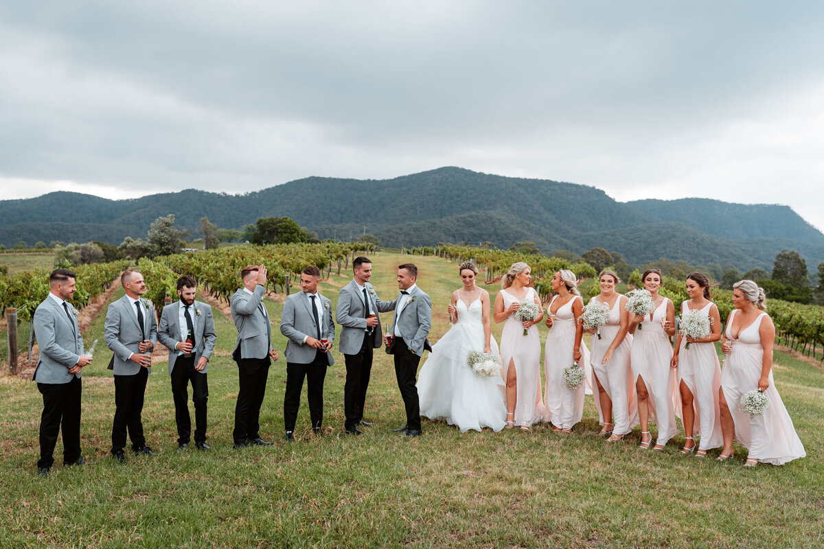 Emily & Ben together with their awesome bridesmaids and groomsmen!
