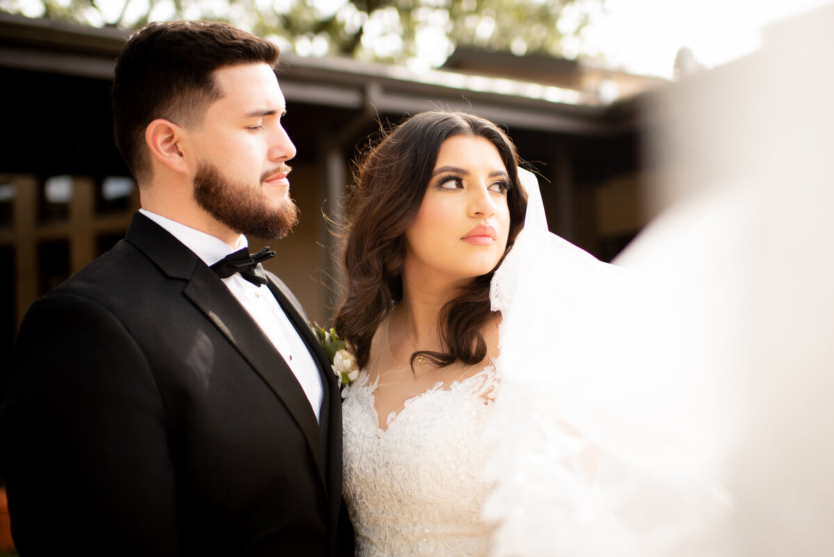 Step into the world of editorial elegance with a captivating bride and groom photo at Anais Events Center in Bellaire, Texas, where love and style take center stage