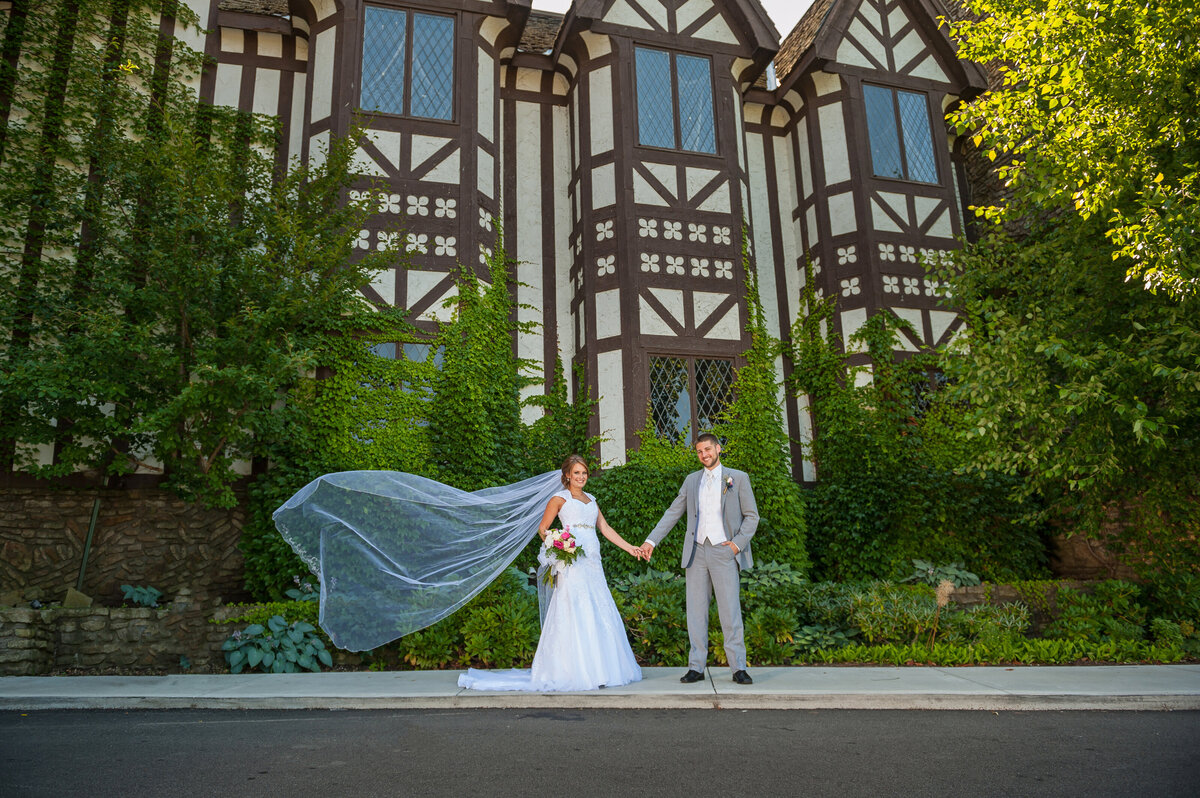 Brides veil blowing in wind at Peek'n Peak Resort.