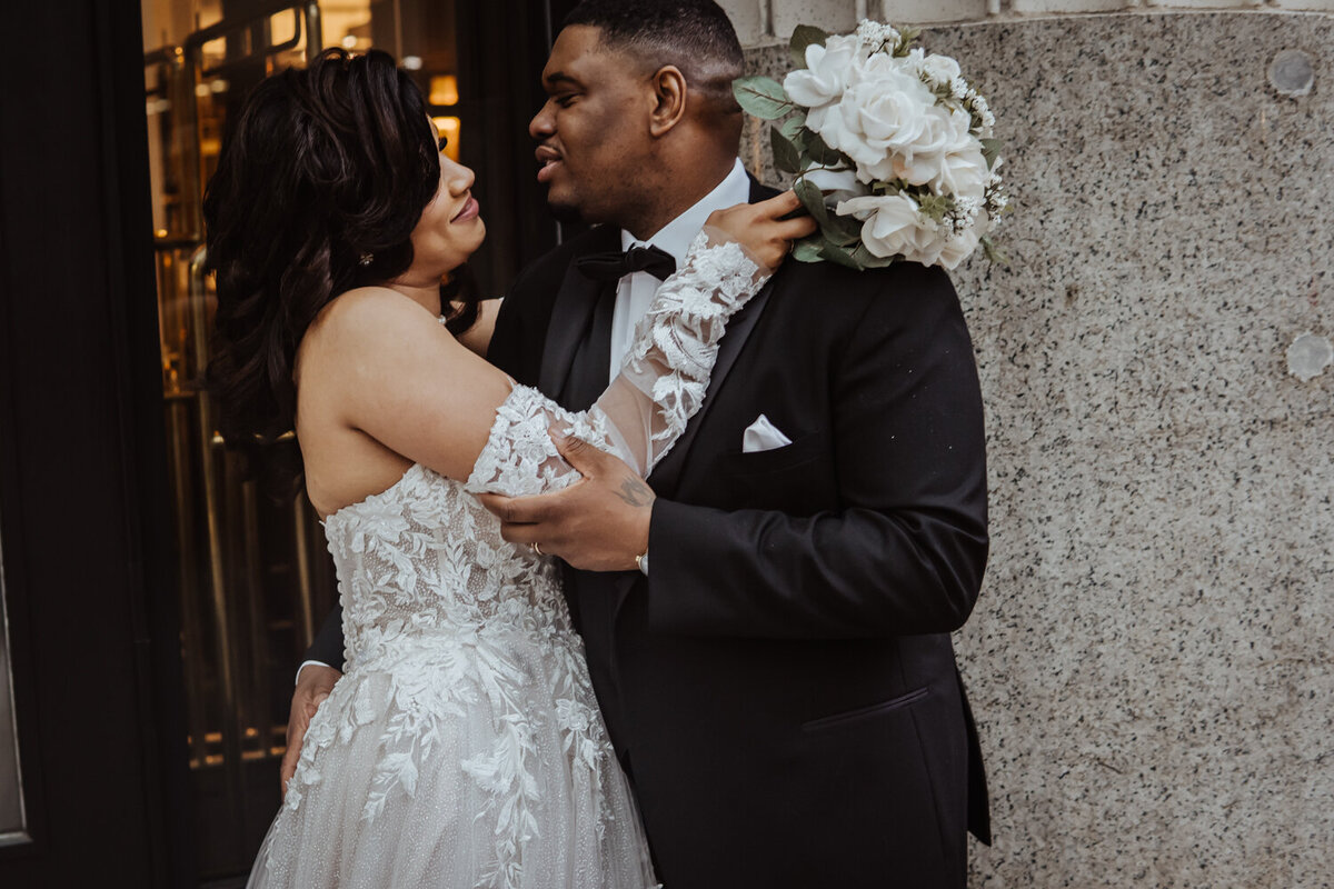 downtown-des-moines-romantic-wedding-couple-surety-hotel-des-moines-wedding-photographer-storyteller-collective-photo-co
