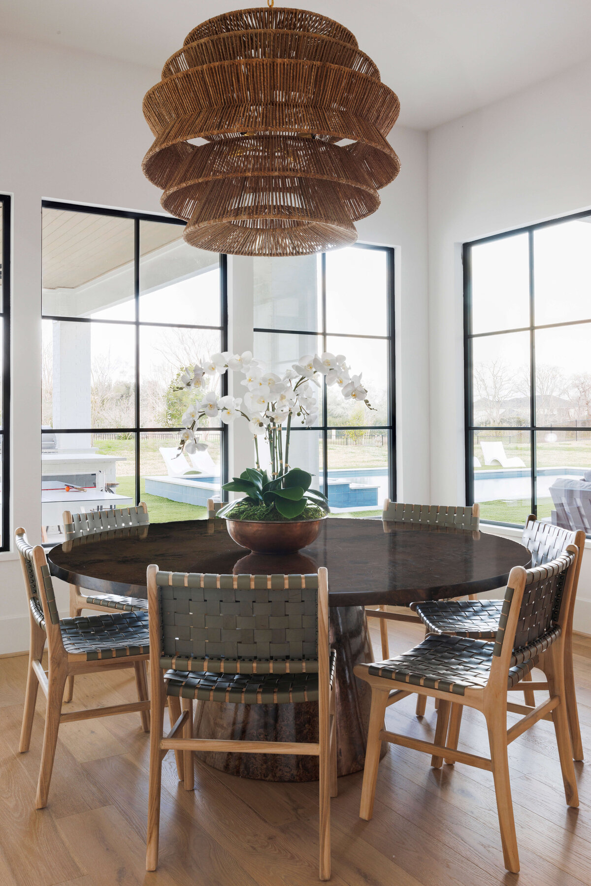oyster creek studios missouri city new build woven chairs around dining room table with flowers